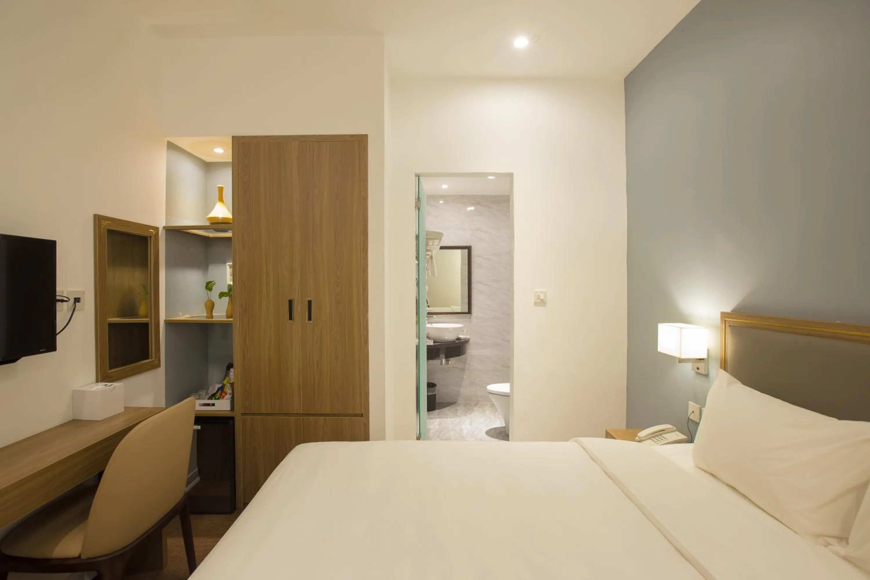 Seating area, Bed in Vy House