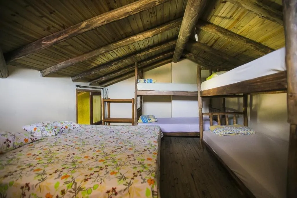 Bed in Pousada Pé na Areia