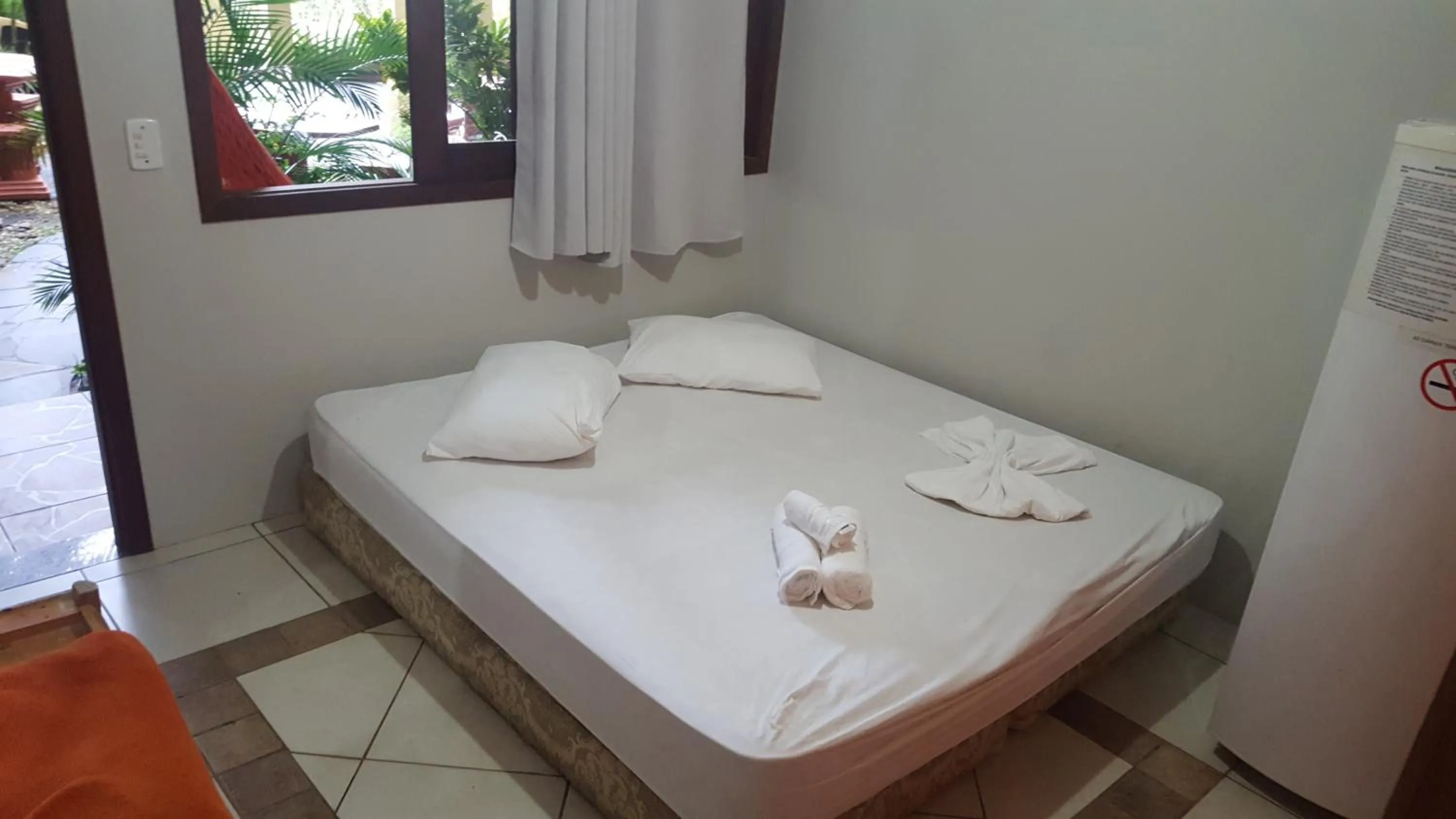 Bed in Pousada Pé na Areia