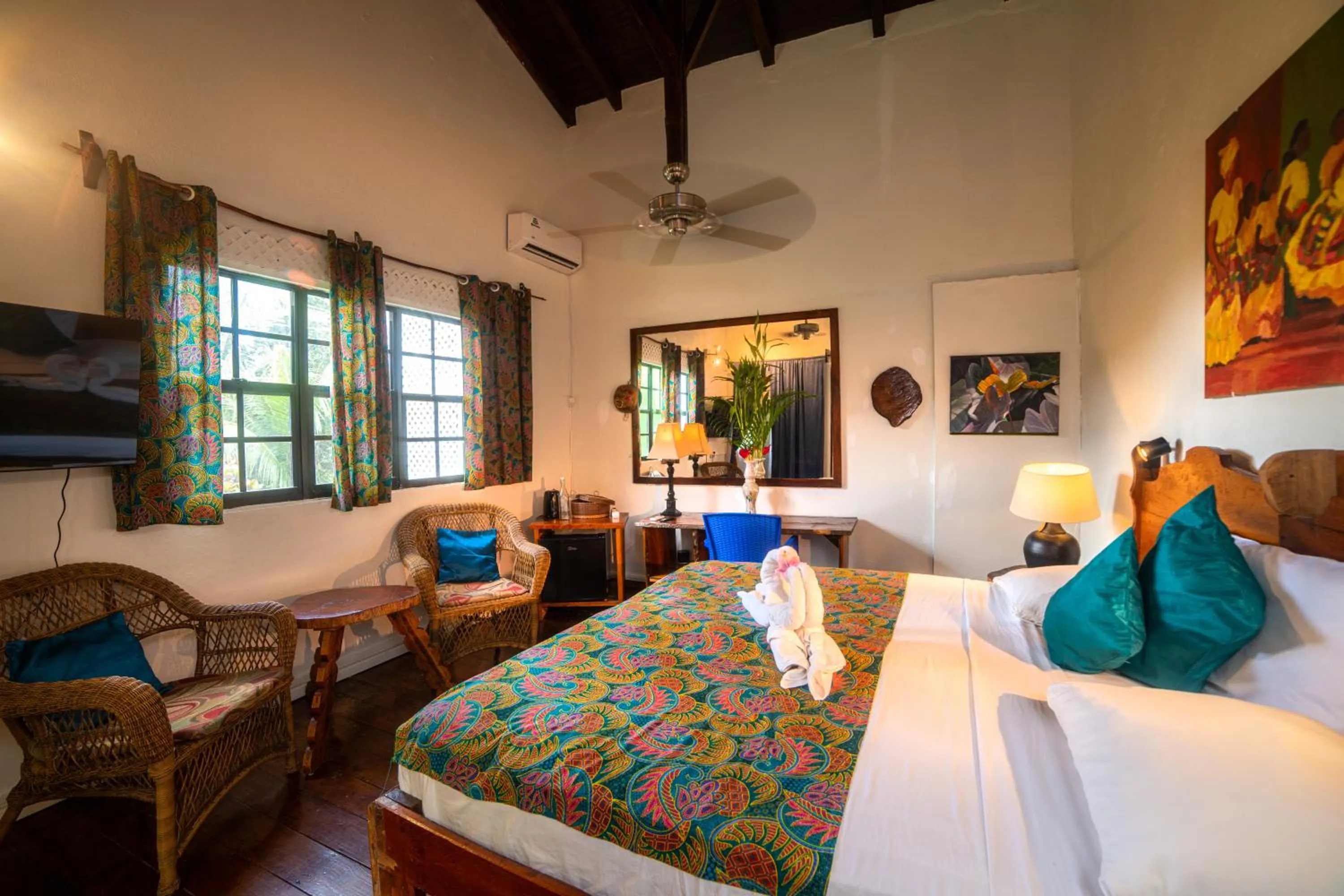 Bed in Hibiscus Valley Inn