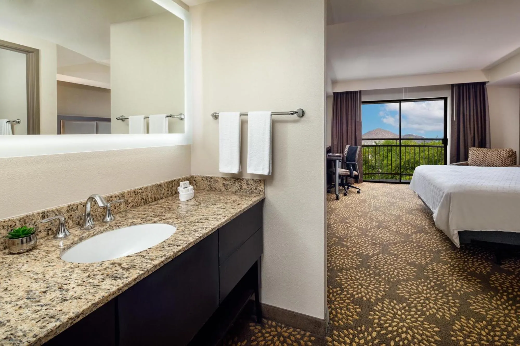 Bathroom, Bed in Holiday Inn and Suites Phoenix Airport North by IHG