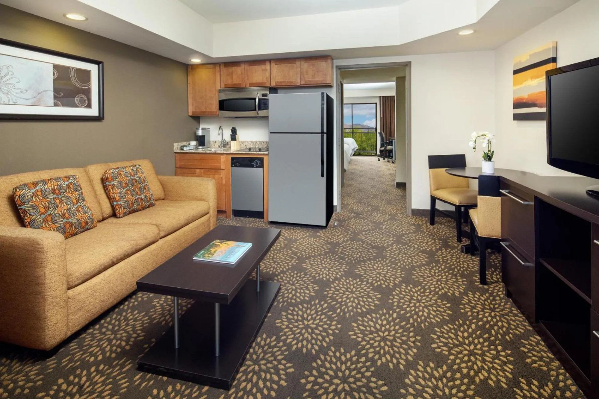 Seating area in Holiday Inn and Suites Phoenix Airport North by IHG