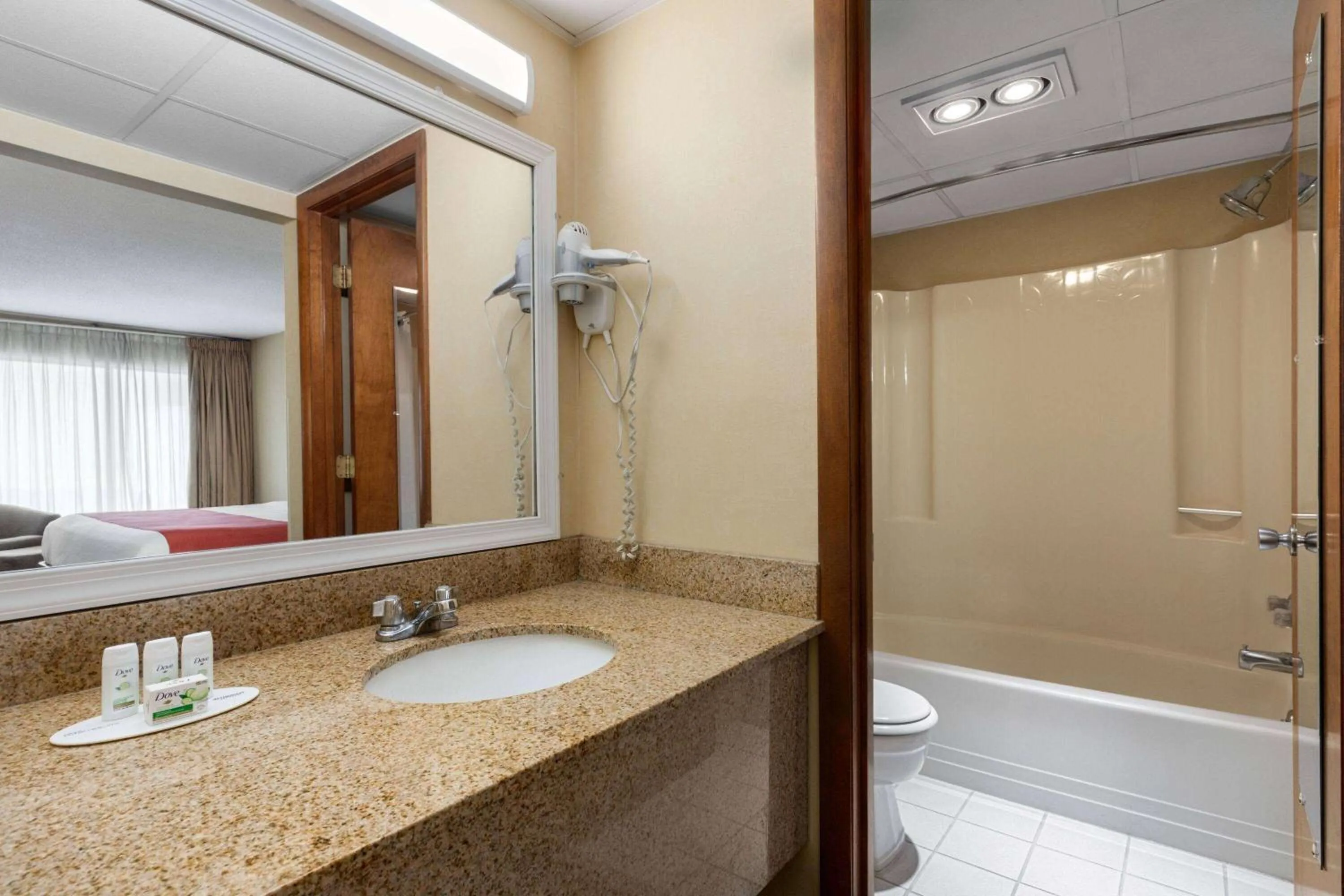 Bathroom, Bed in Baymont by Wyndham Lynchburg