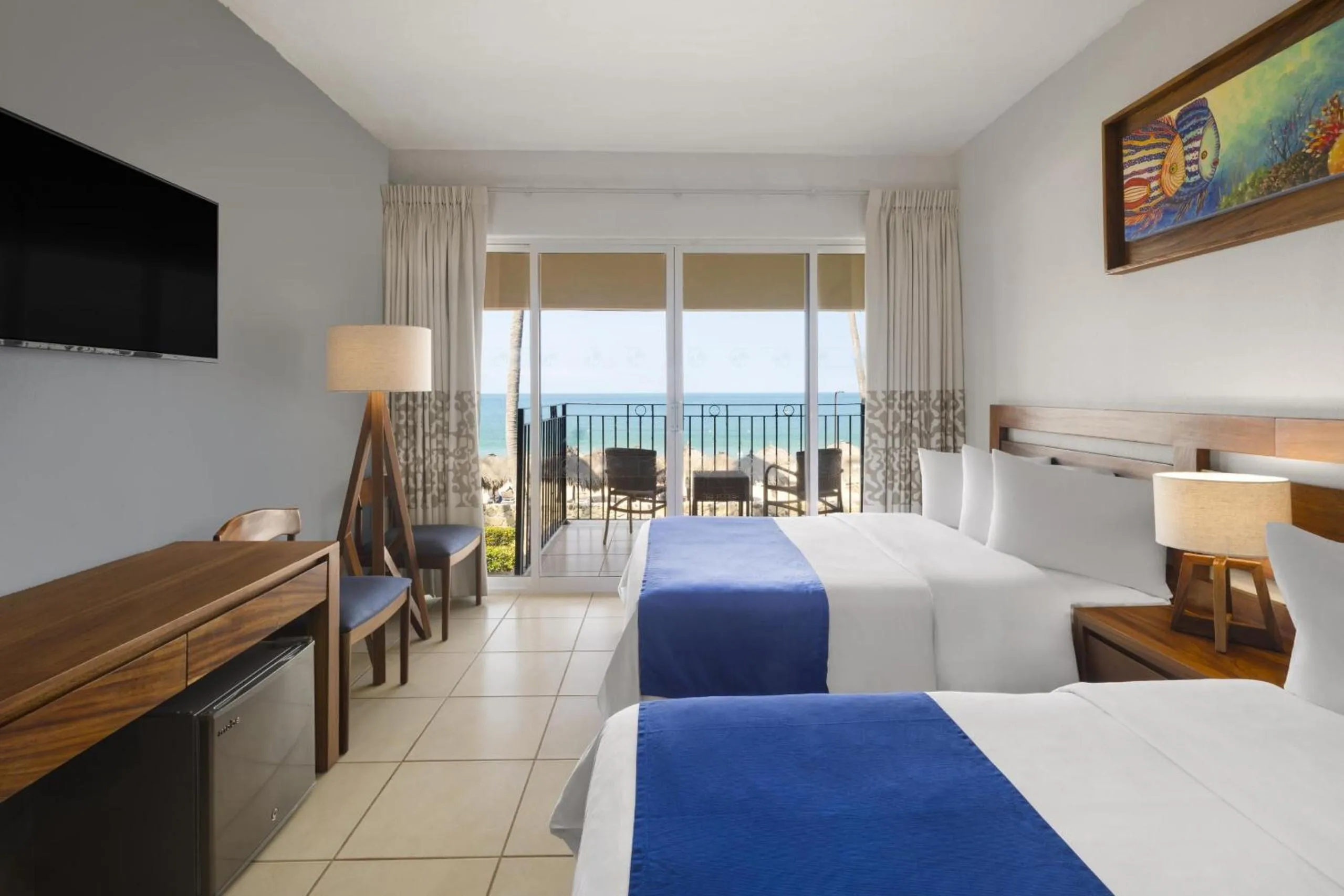 Bed in Grand Decameron Complex Bucerias, A Trademark All-Inclusive Resort