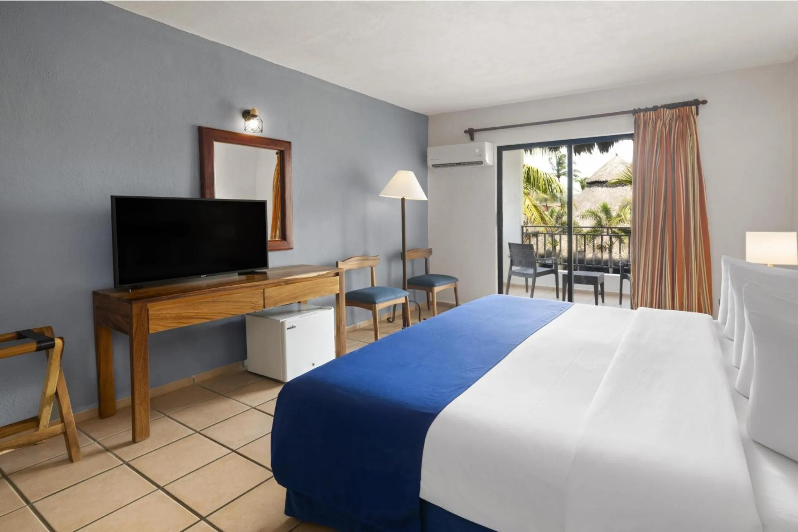 Photo of the whole room, Bed in Grand Decameron Complex Bucerias, A Trademark All-Inclusive Resort