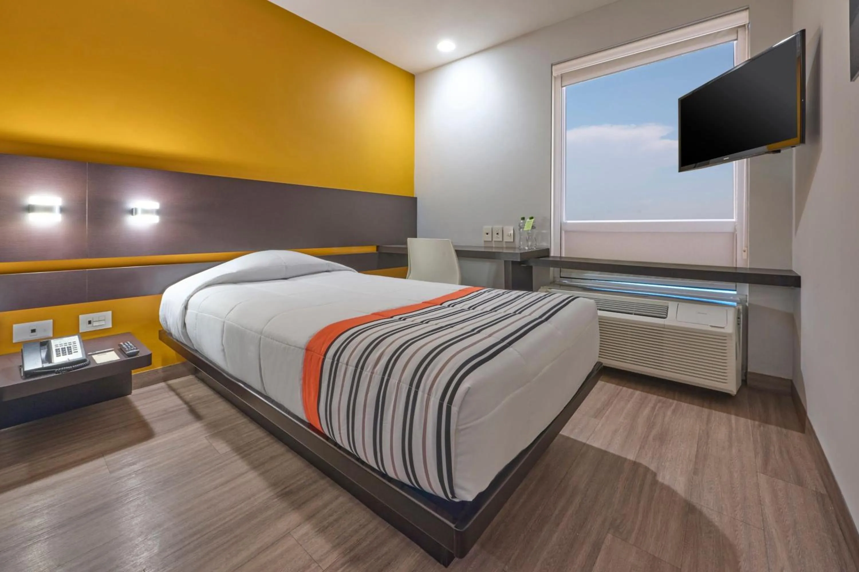 Bedroom, Bed in City Express Junior by Marriott Mexicali