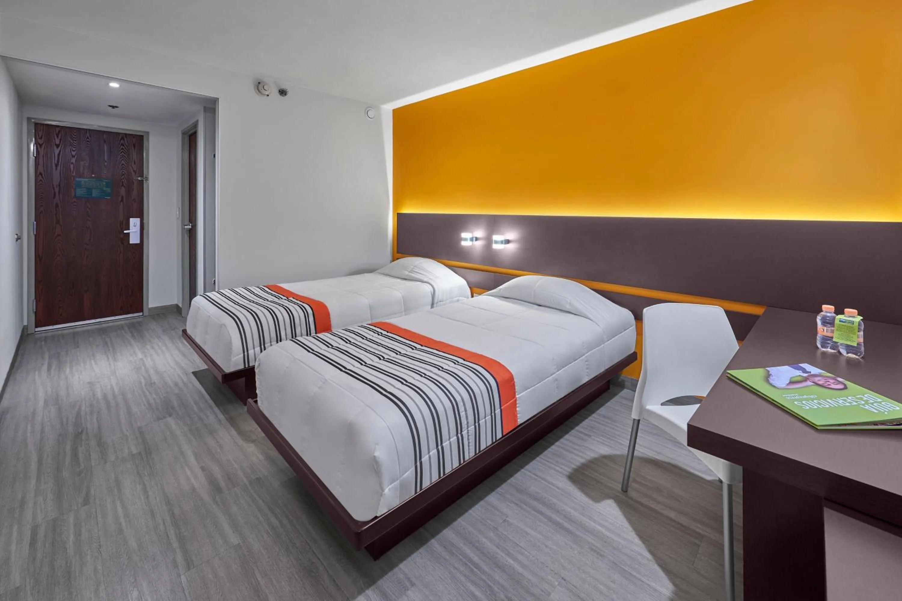 Bedroom, Bed in City Express Junior by Marriott Mexicali