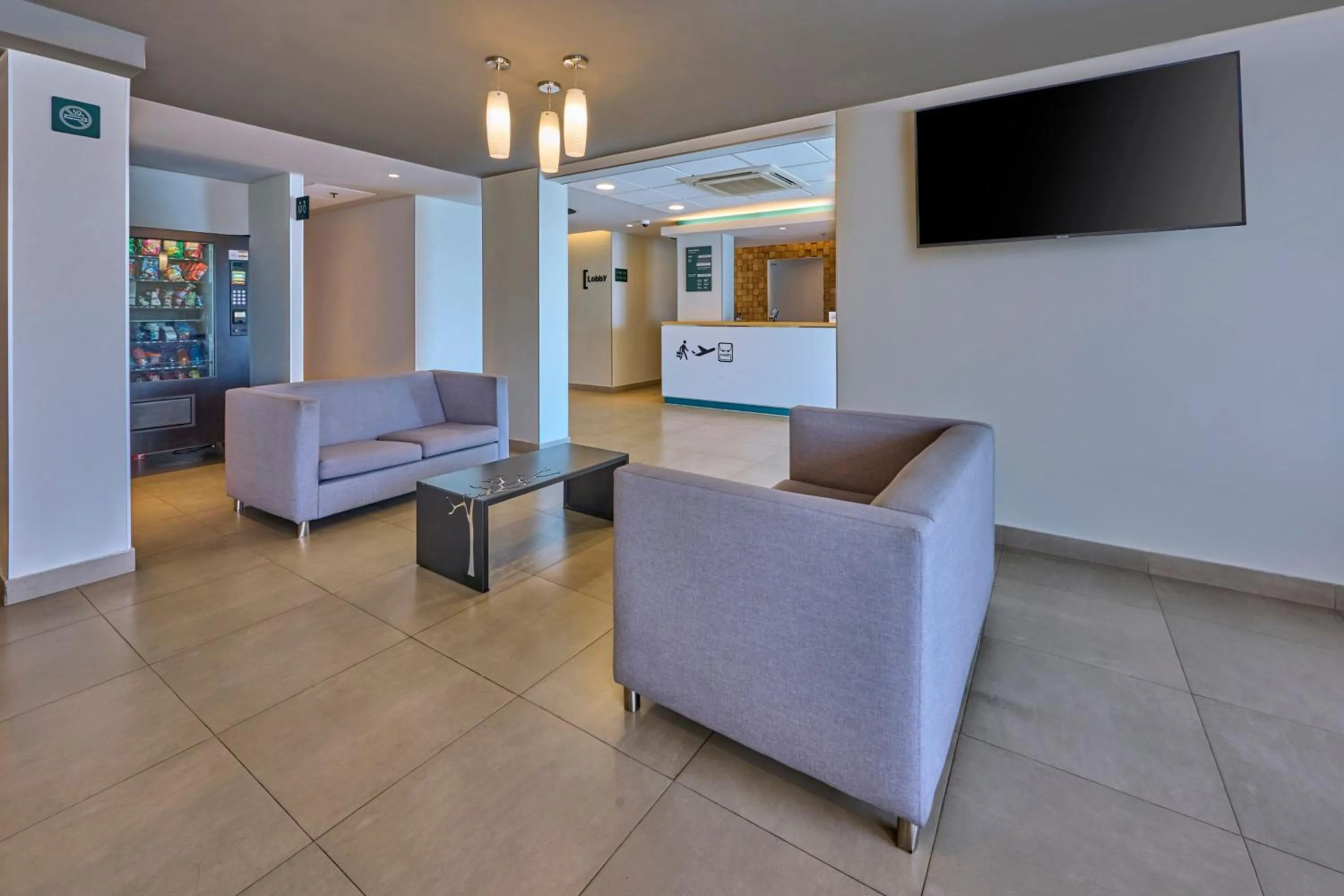Lobby or reception in City Express Junior by Marriott Mexicali