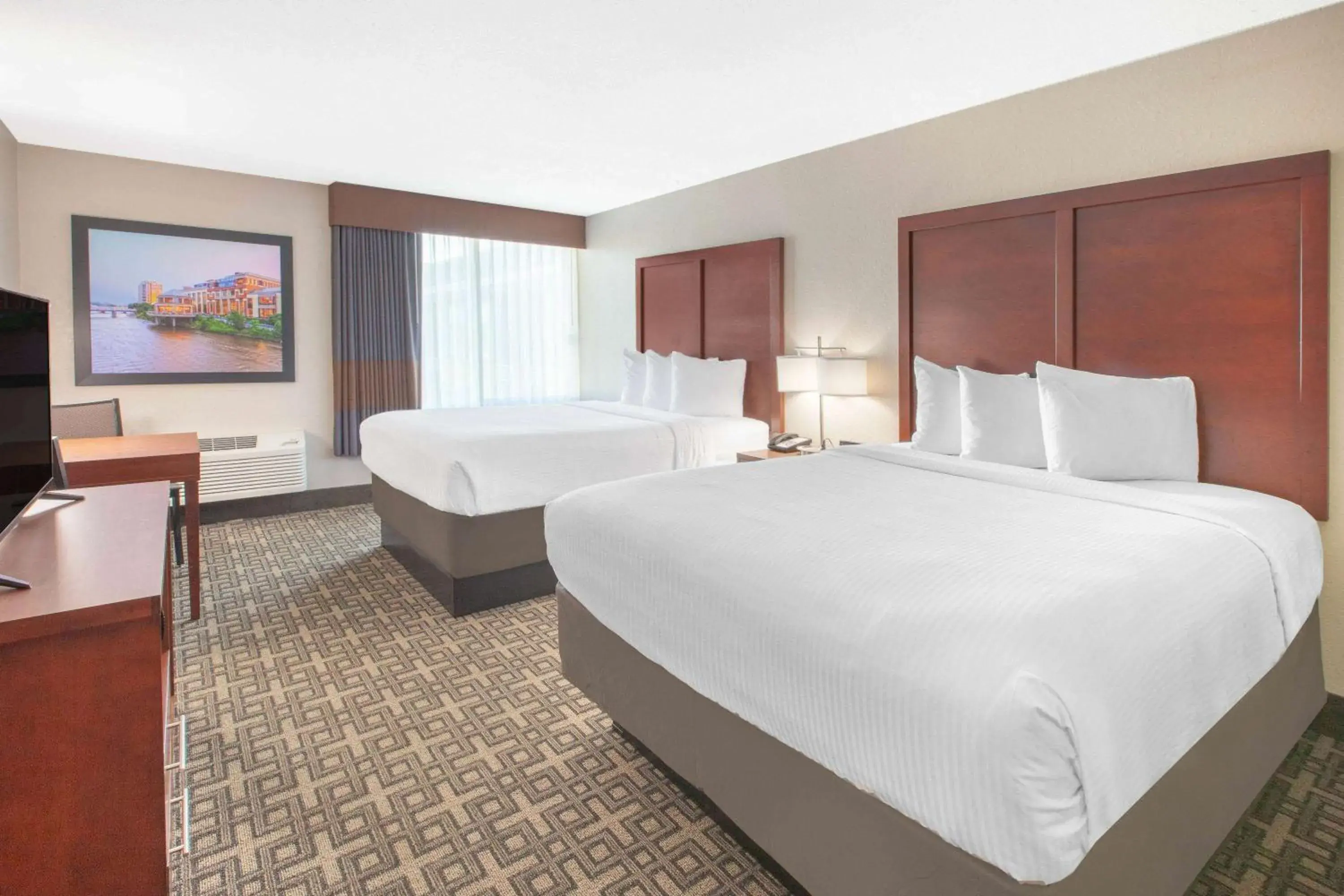 Photo of the whole room, Bed in Baymont by Wyndham Grand Rapids Near Downtown