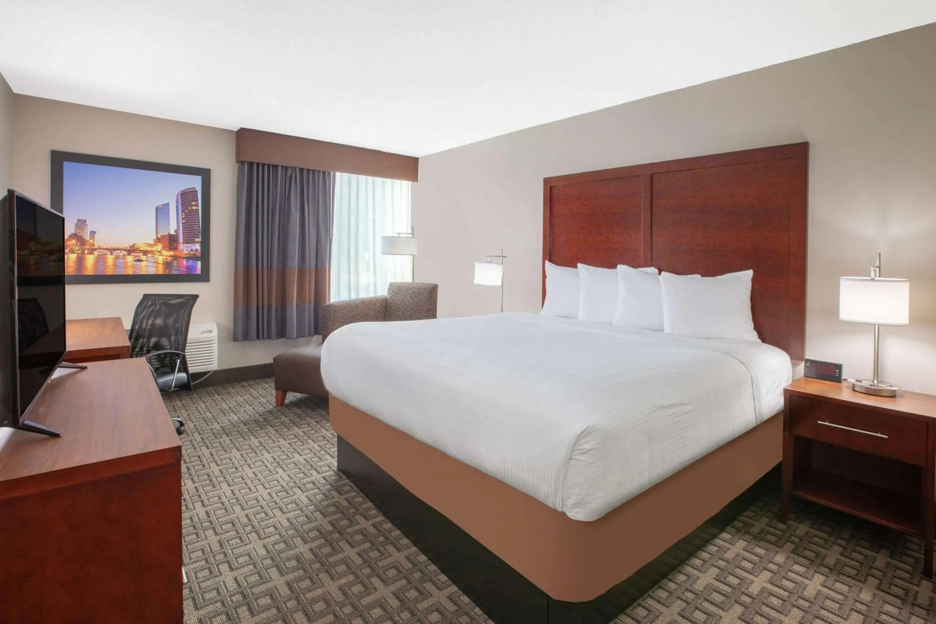 Bed in Baymont by Wyndham Grand Rapids Near Downtown