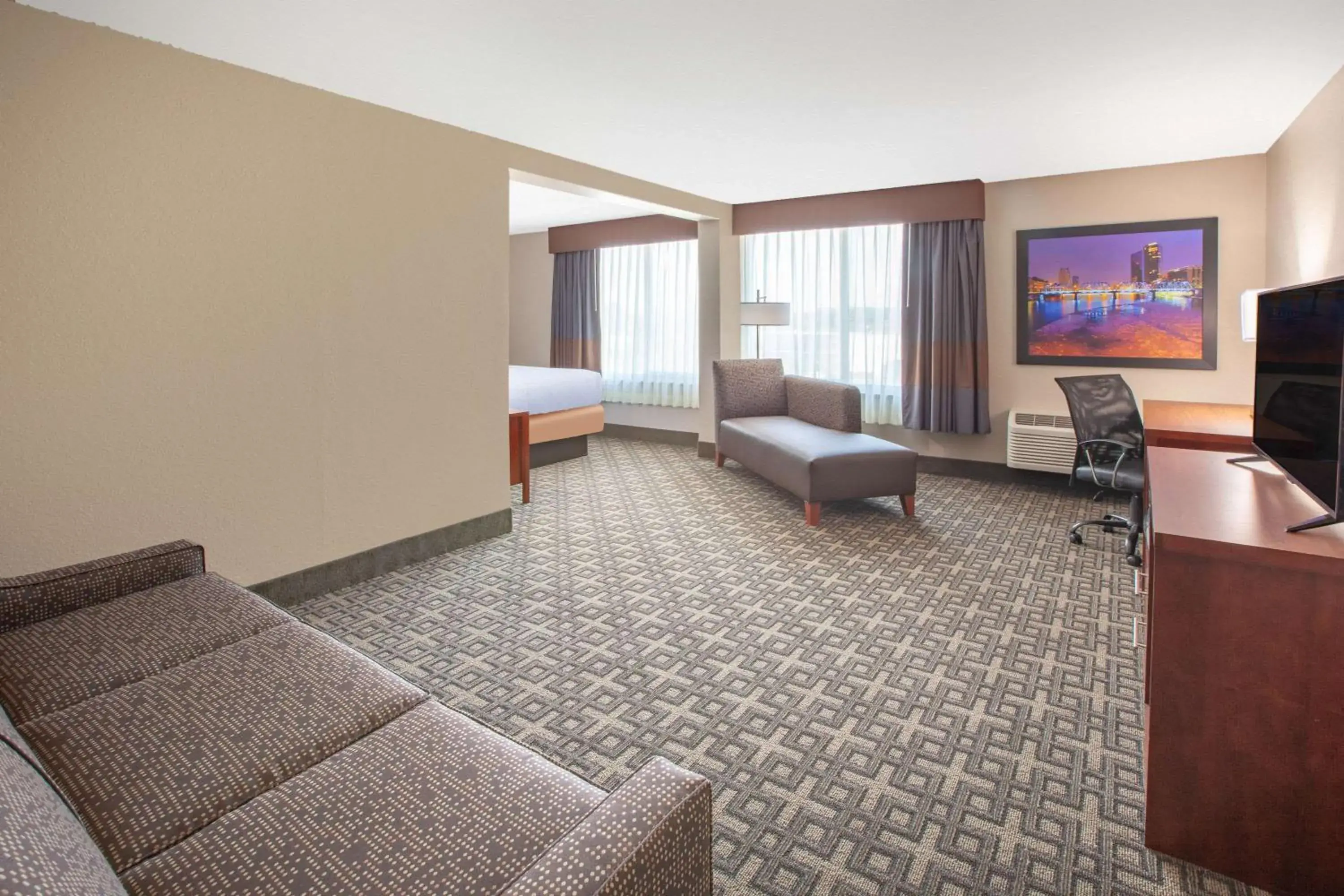Photo of the whole room, Seating Area in Baymont by Wyndham Grand Rapids Near Downtown