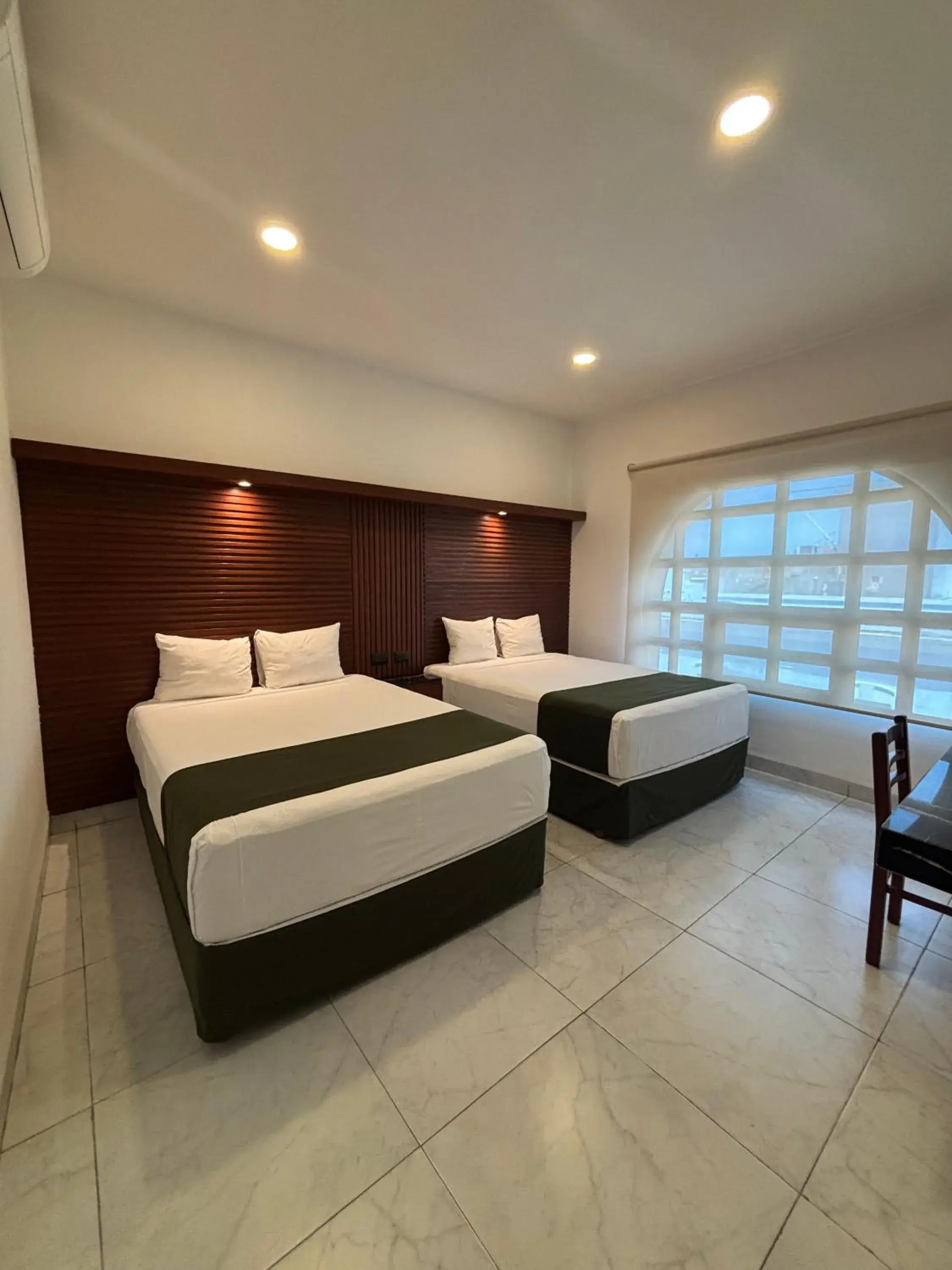 Photo of the whole room, Bed in Hotel Colonial de Merida Photo of the whole room, Bed in Hotel Colonial de Merida