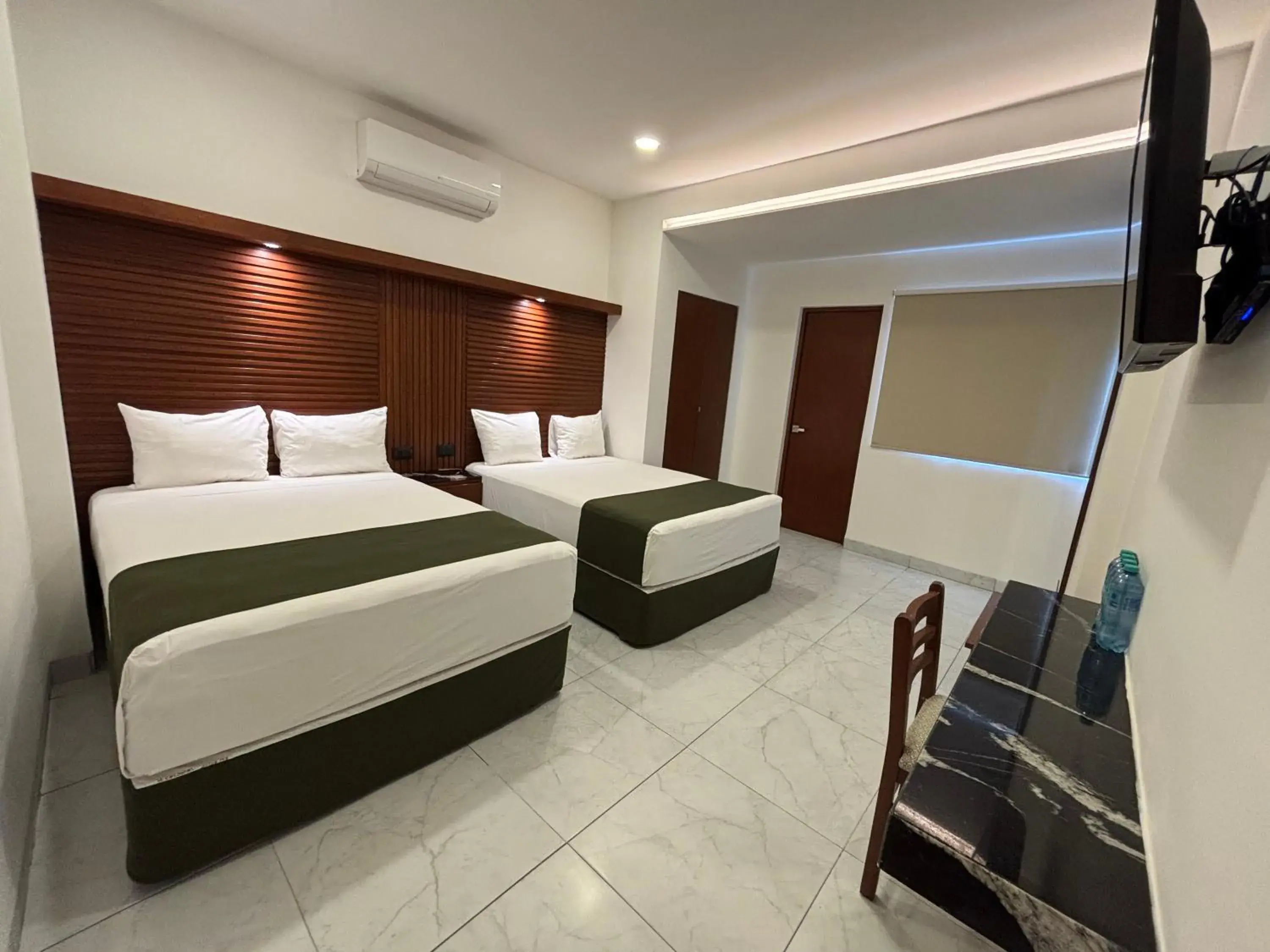 Bed in Hotel Colonial de Merida Bed in Hotel Colonial de Merida