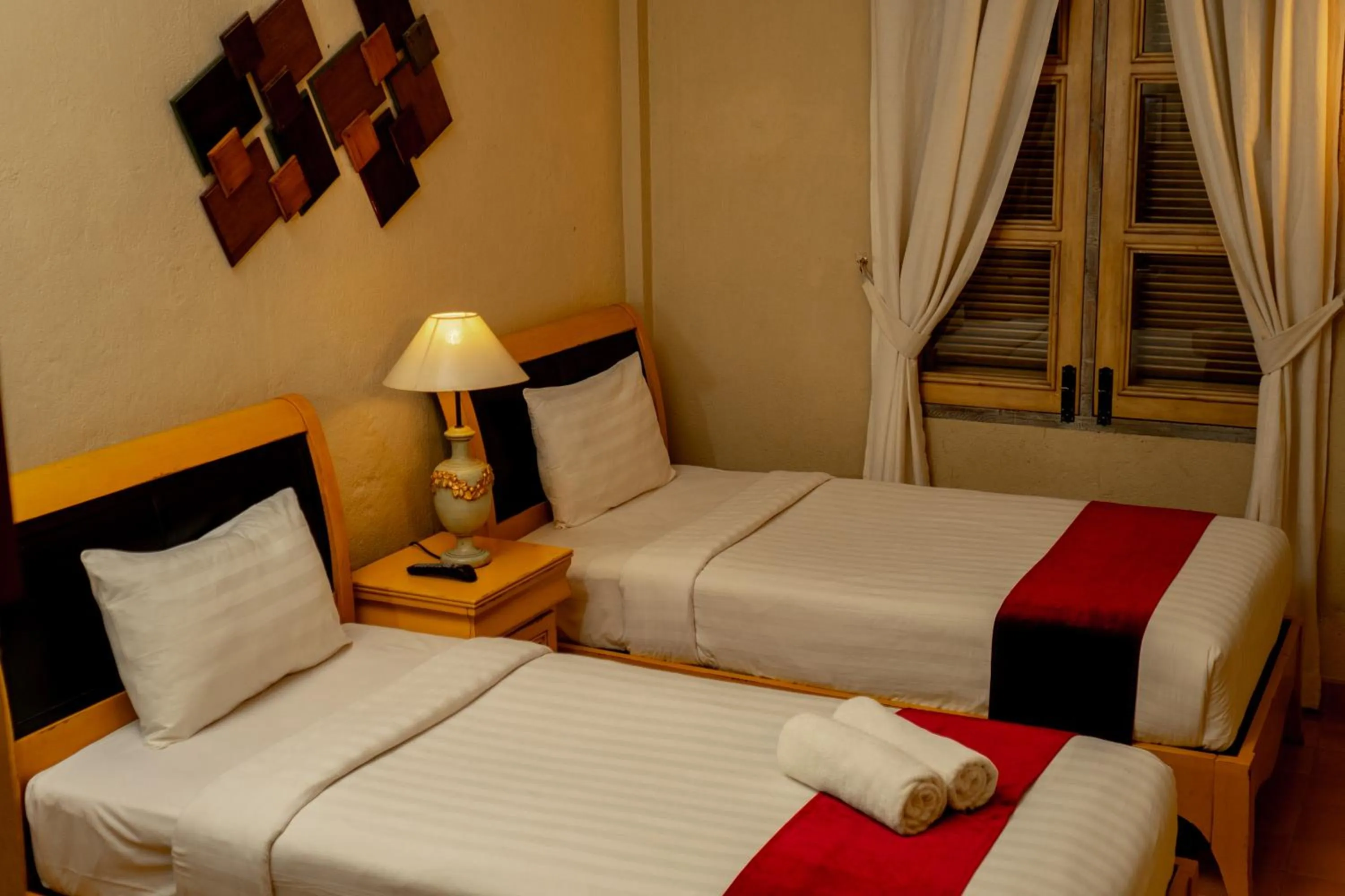 Bed in Kayu Arum Resort