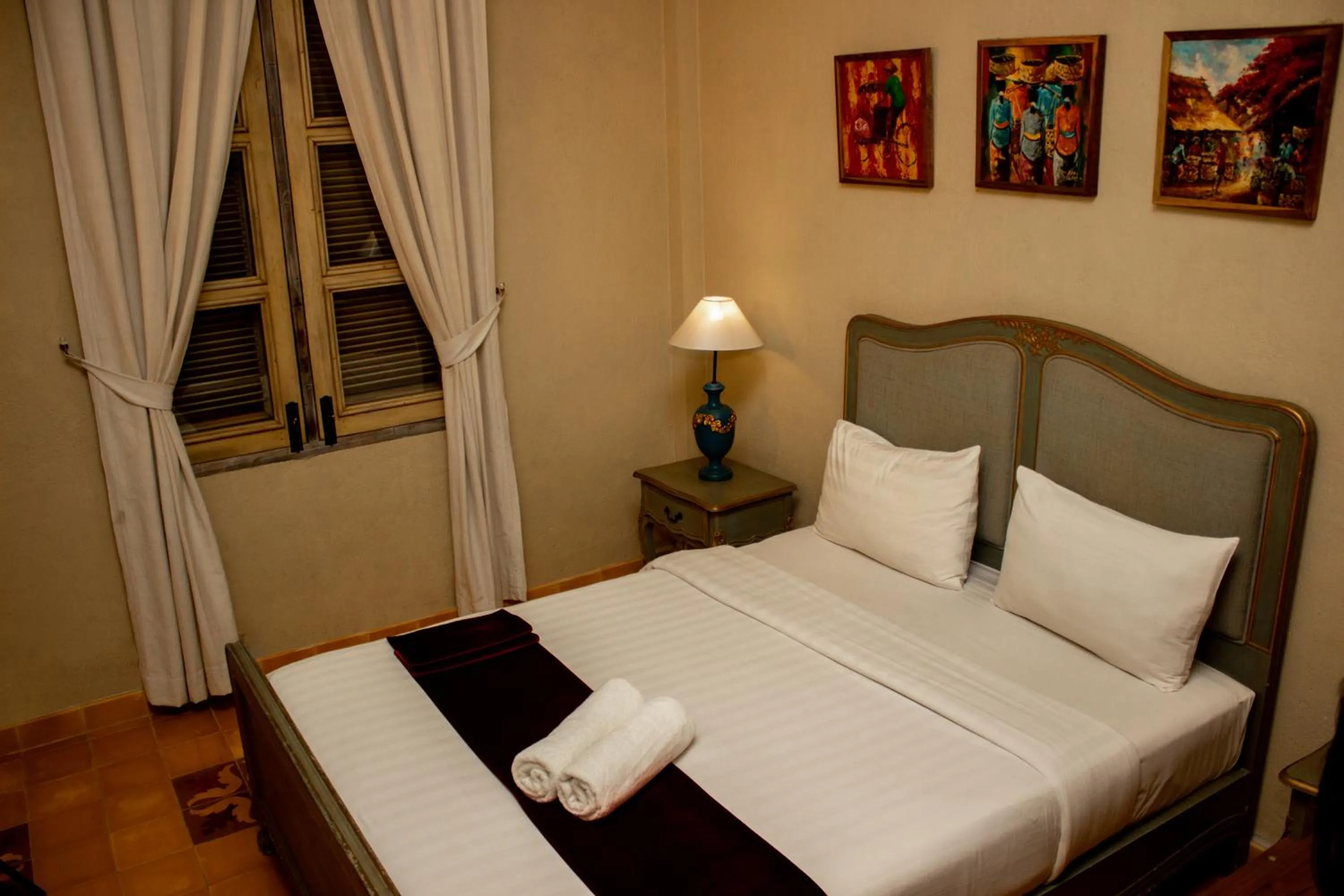 Bed in Kayu Arum Resort