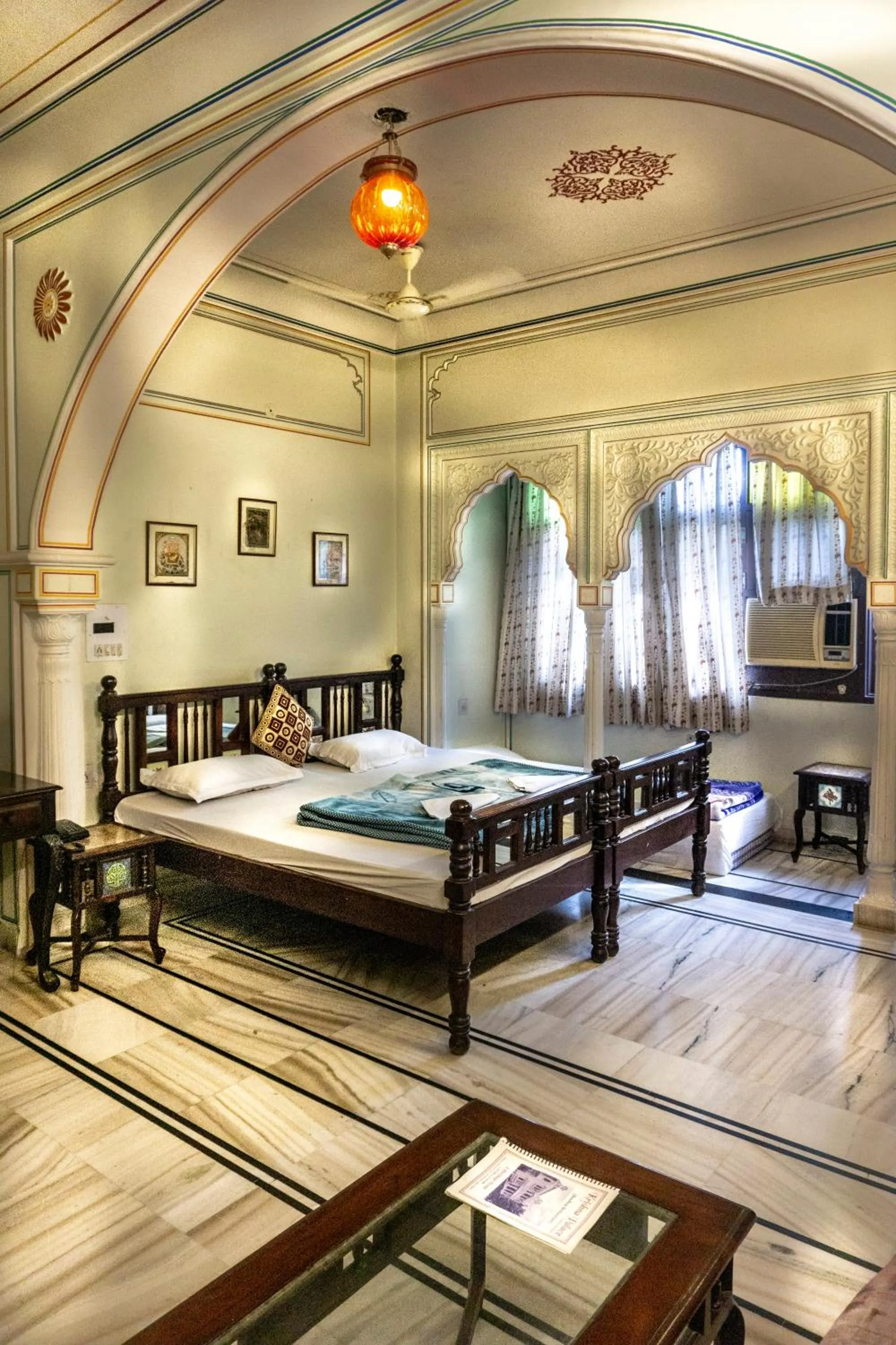 Bed in Krishna Palace - A Heritage Boutique Hotel