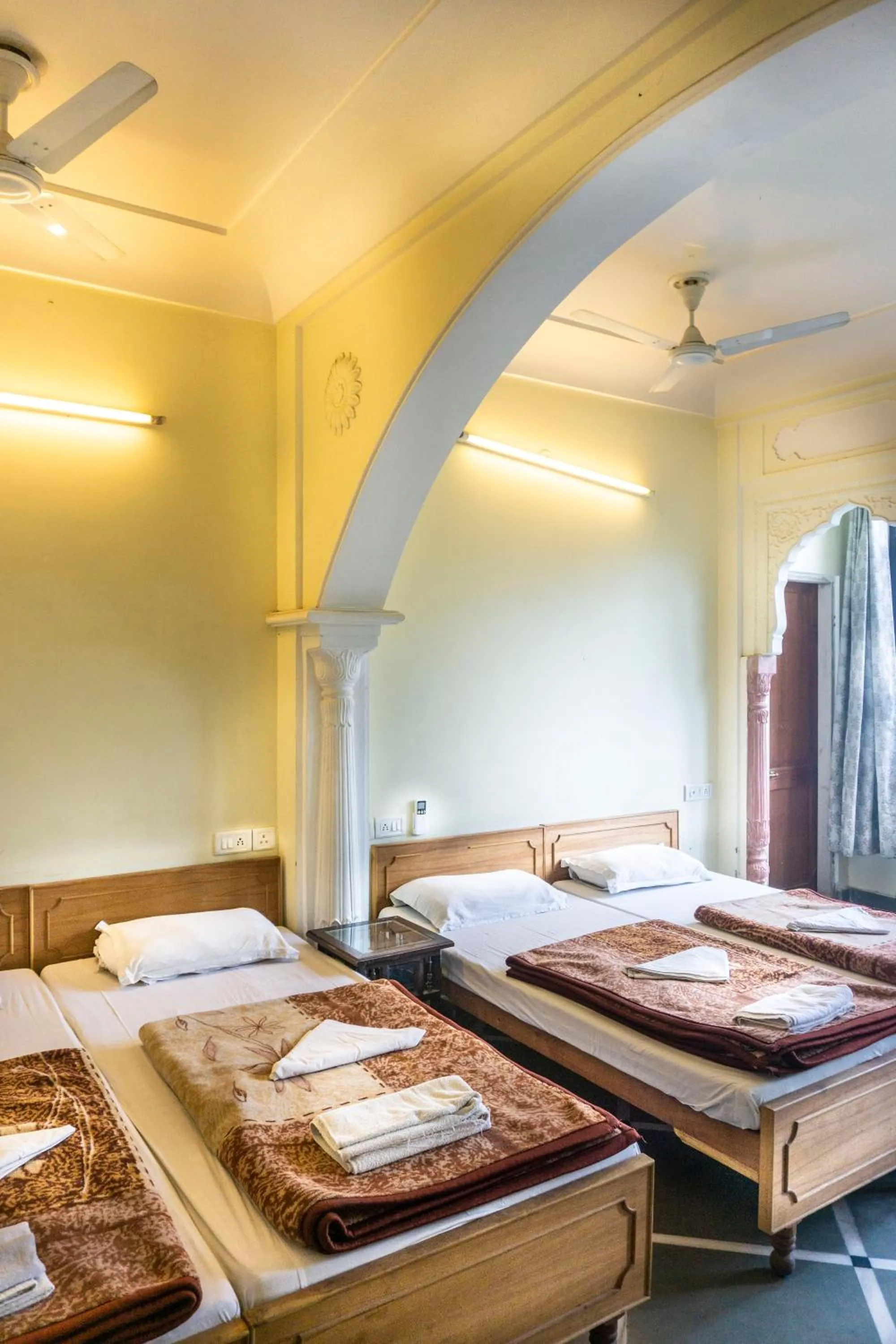 Bed in Krishna Palace - A Heritage Boutique Hotel
