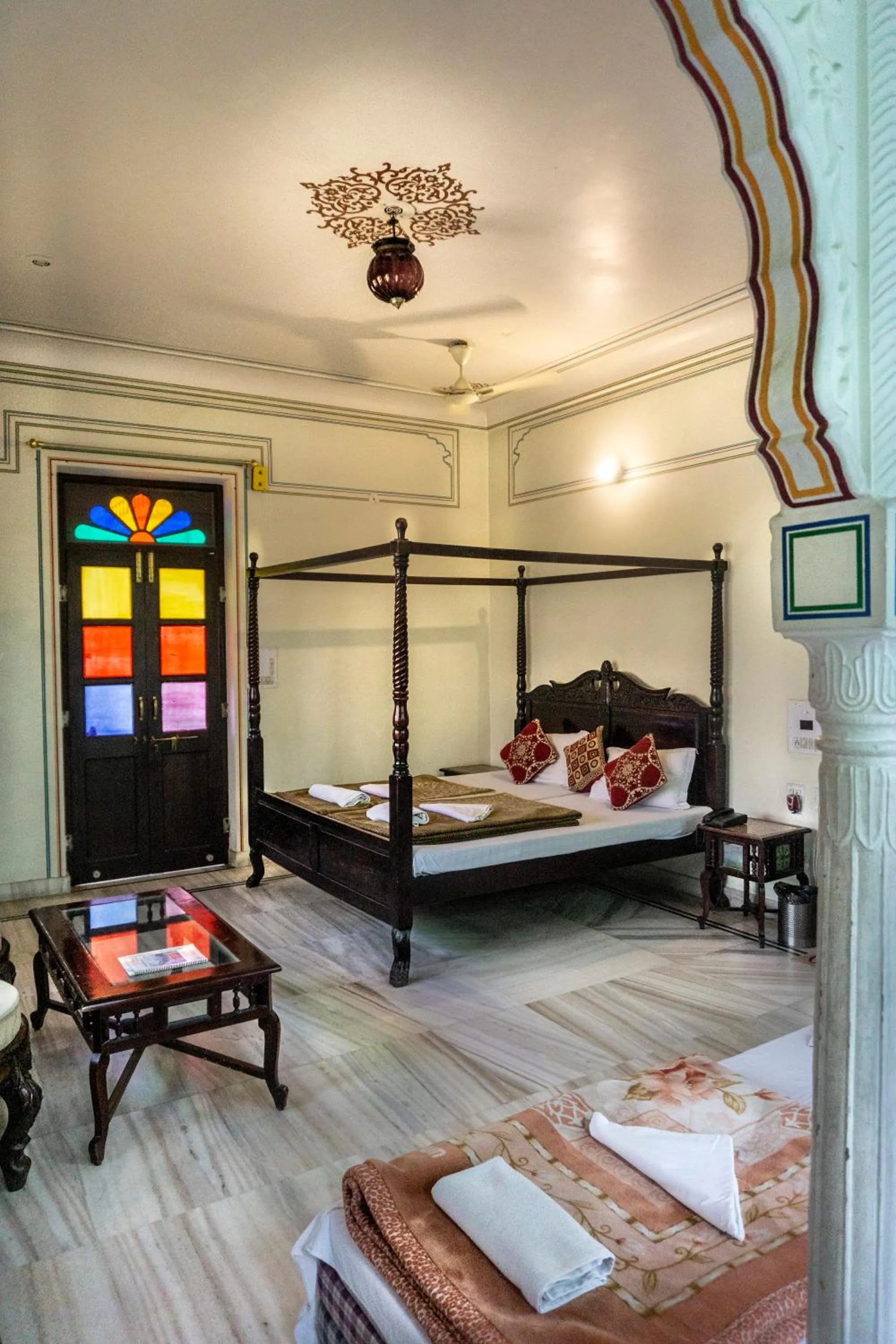 Bed in Krishna Palace - A Heritage Boutique Hotel