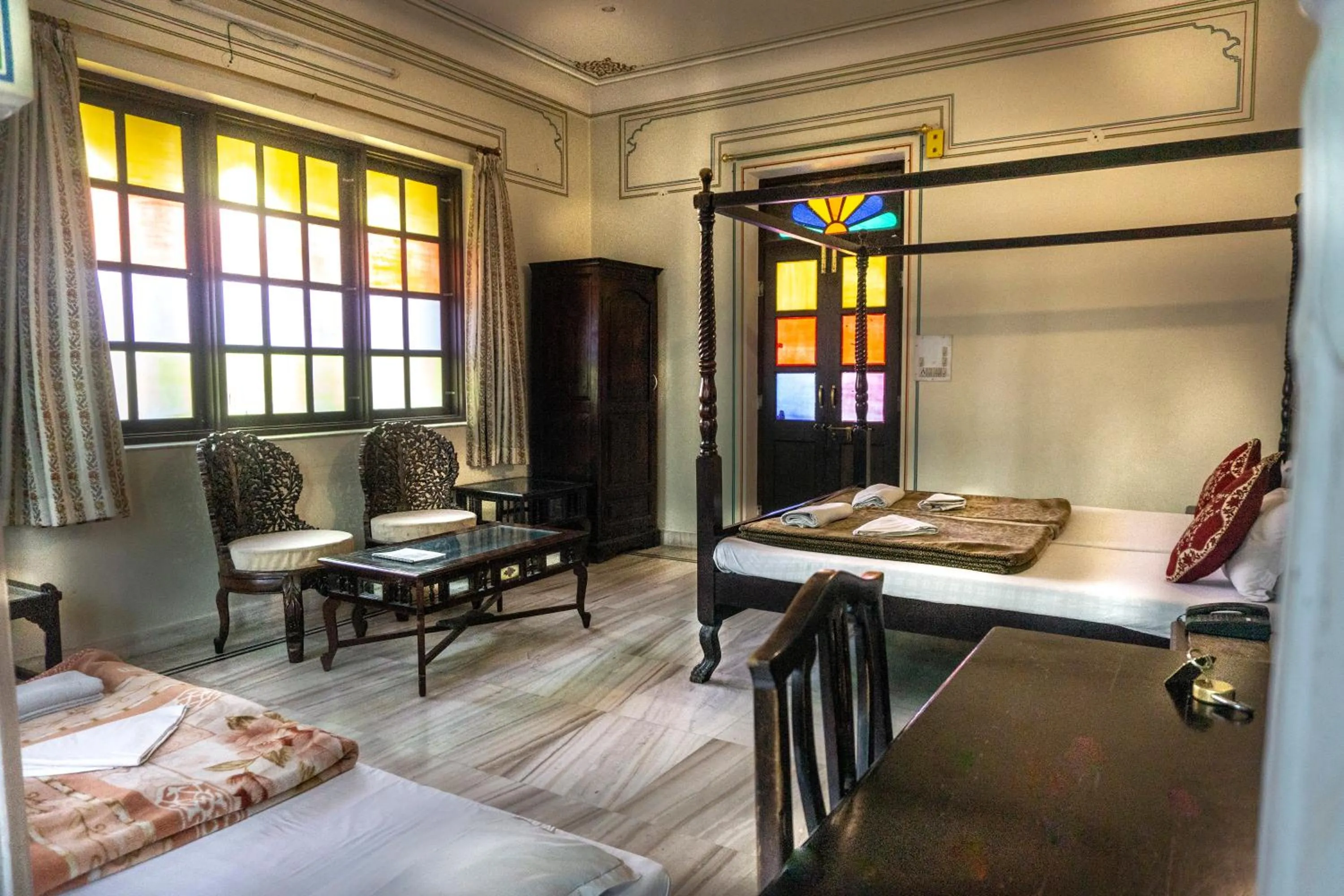 Bed in Krishna Palace - A Heritage Boutique Hotel