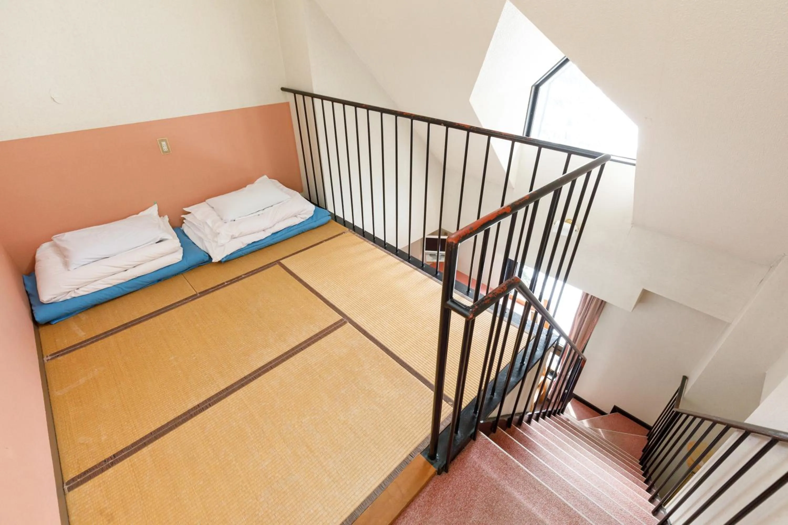 Bed in ホテルにれの樹