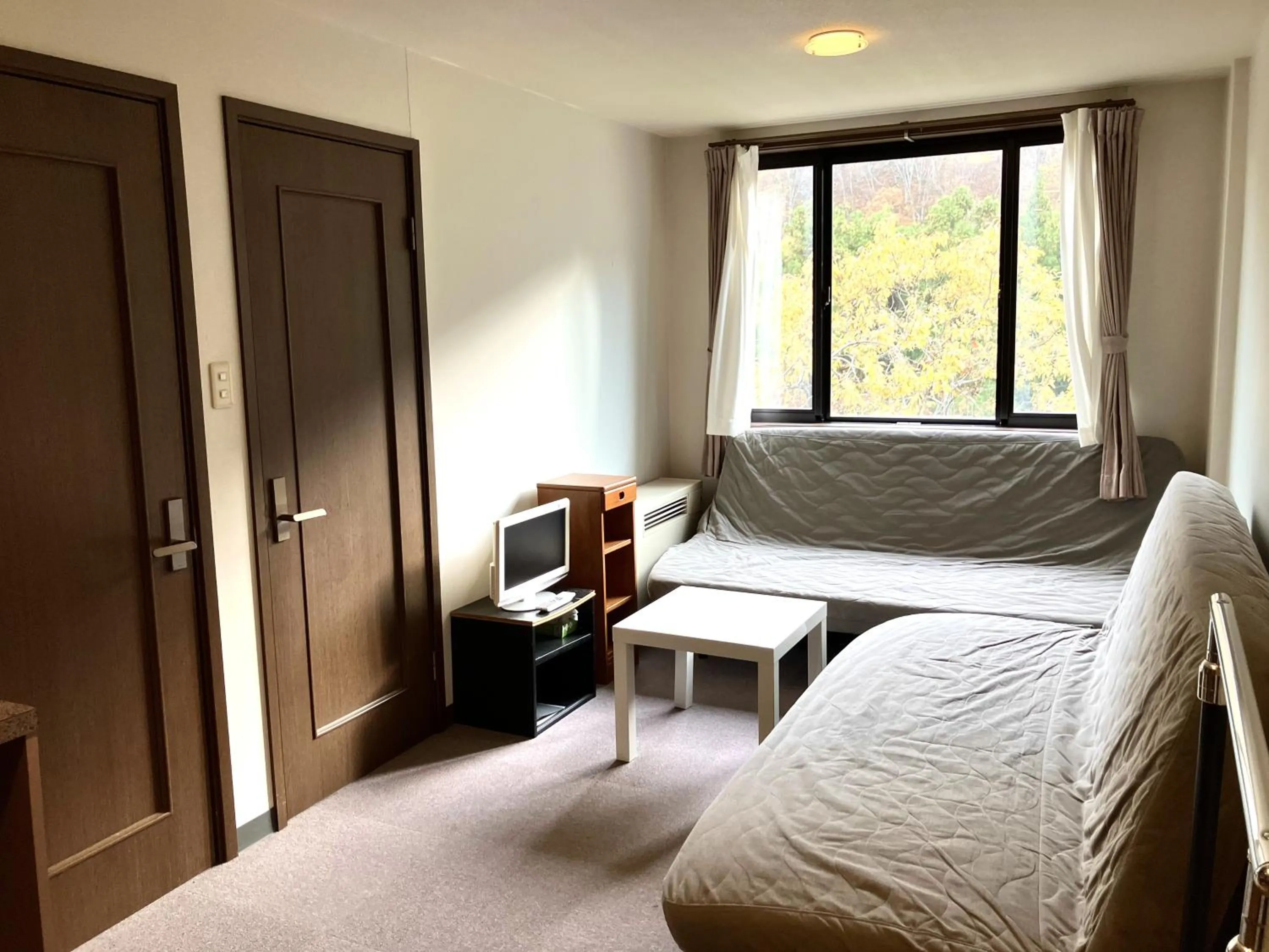 Photo of the whole room, Bed in コンドミニアム白馬五竜