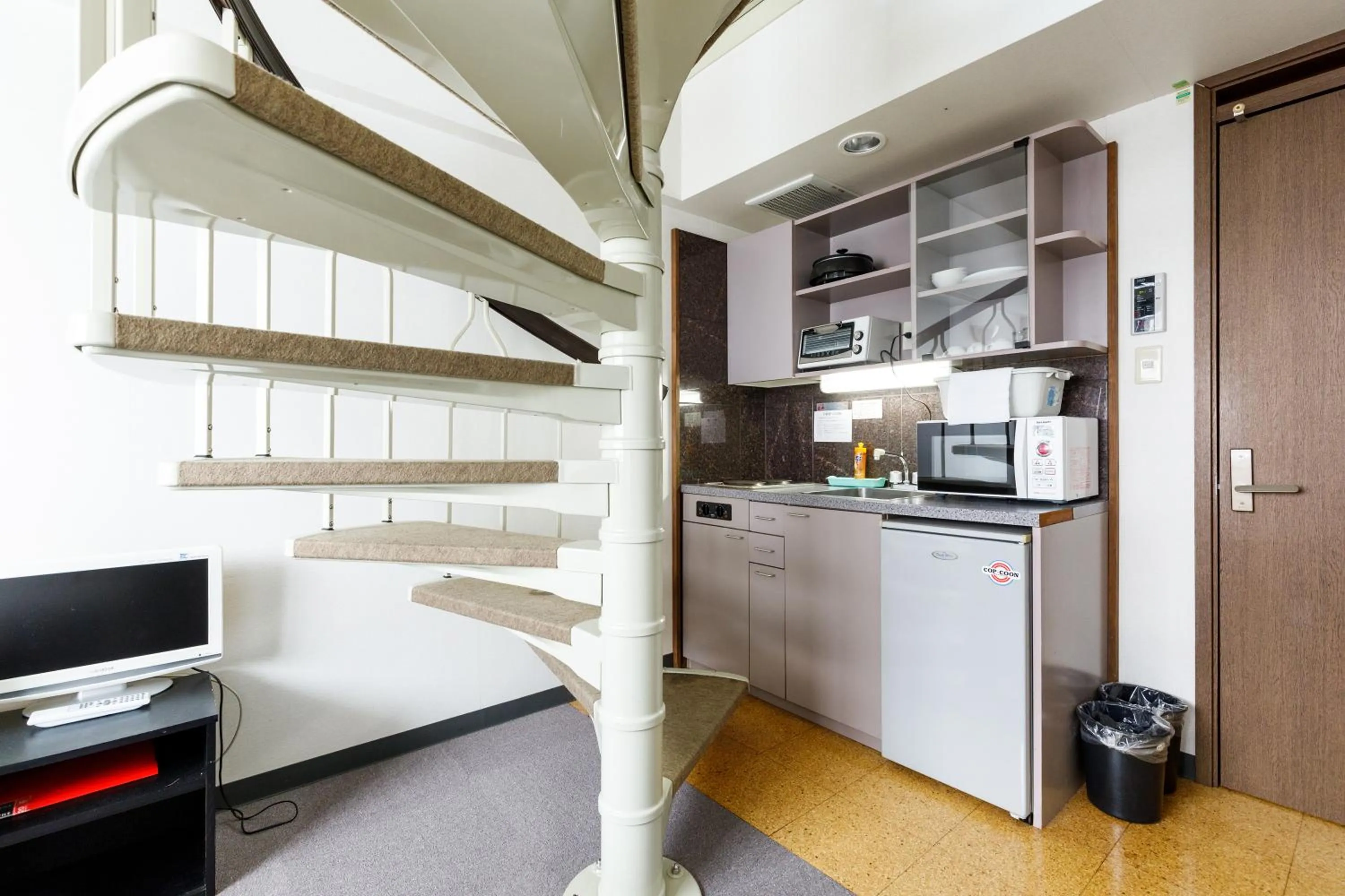 Communal lounge/ TV room in コンドミニアム白馬五竜