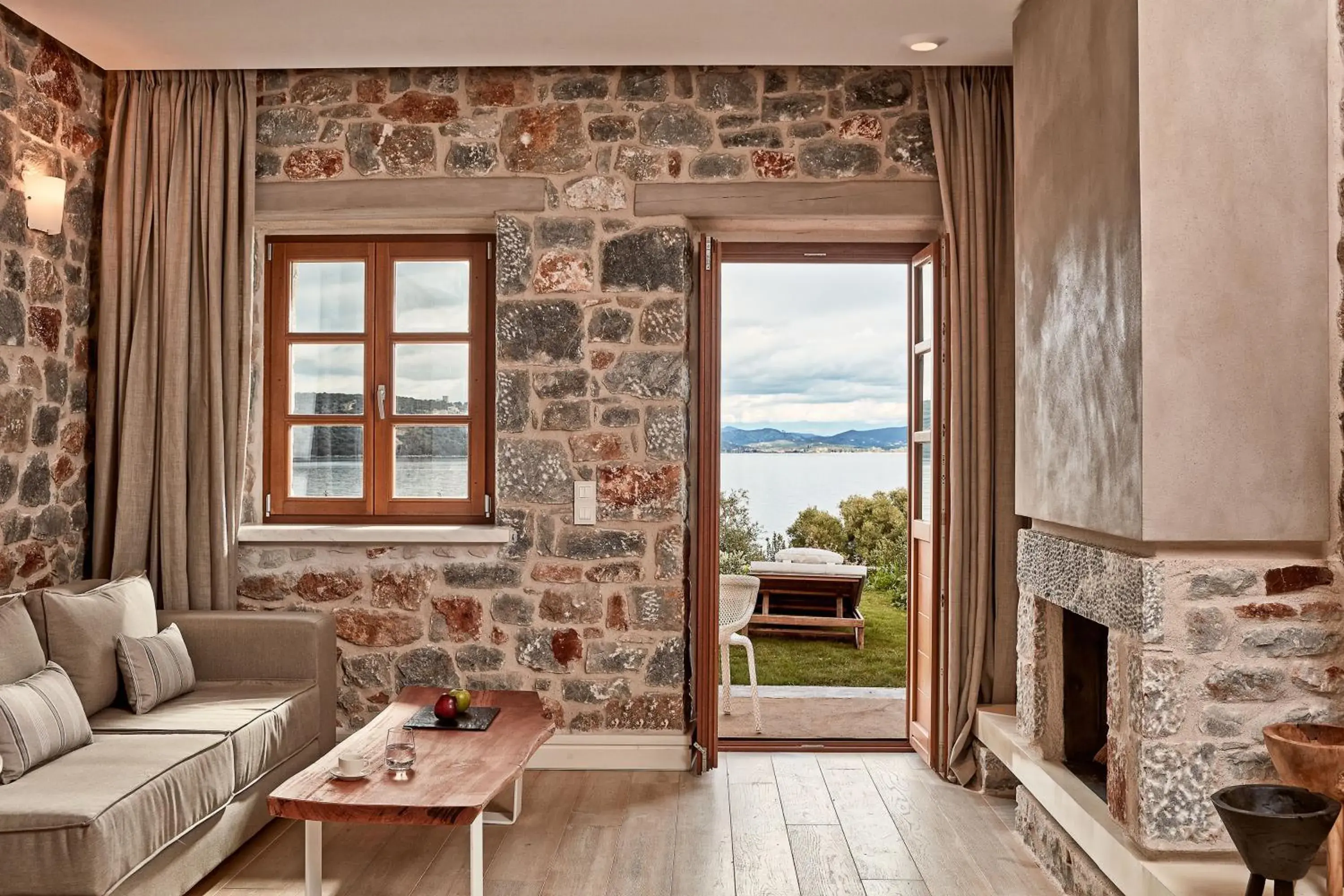 Living room in 100 Rizes Seaside Resort- Small Luxury Hotels of the World Living room in 100 Rizes Seaside Resort- Small Luxury Hotels of the World