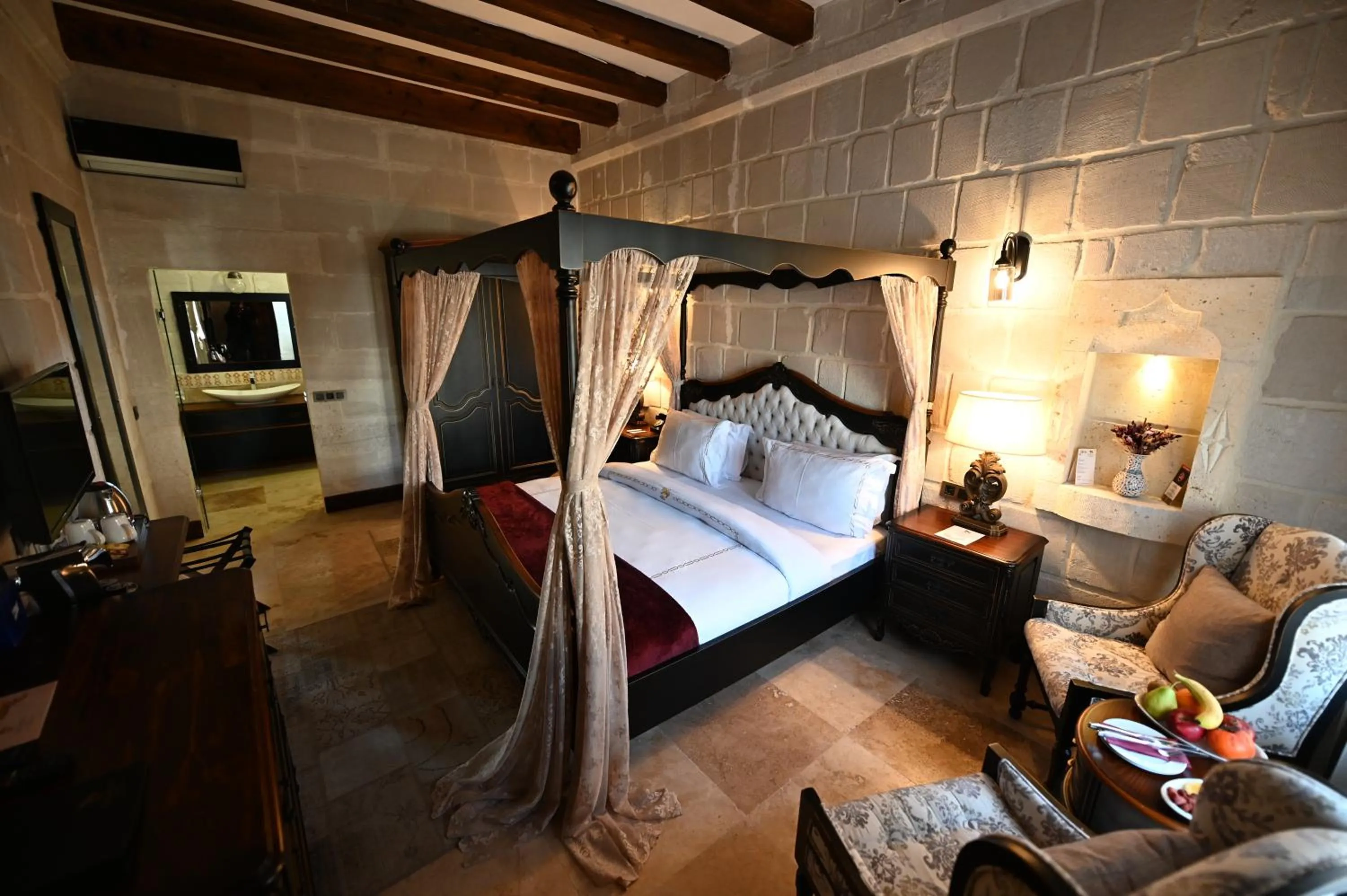 Photo of the whole room, Bed in Seraphim Cave Suites & SPA