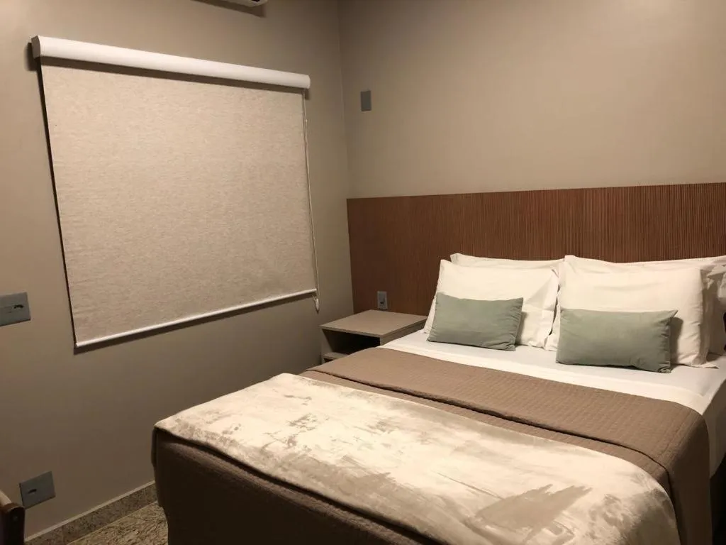 Bed in Hotel Pousada Santa Rita