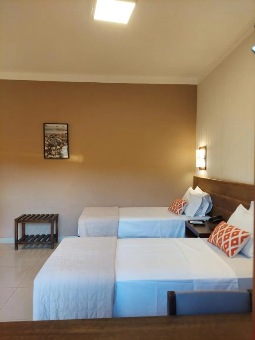 Bed in Hotel Pousada Santa Rita