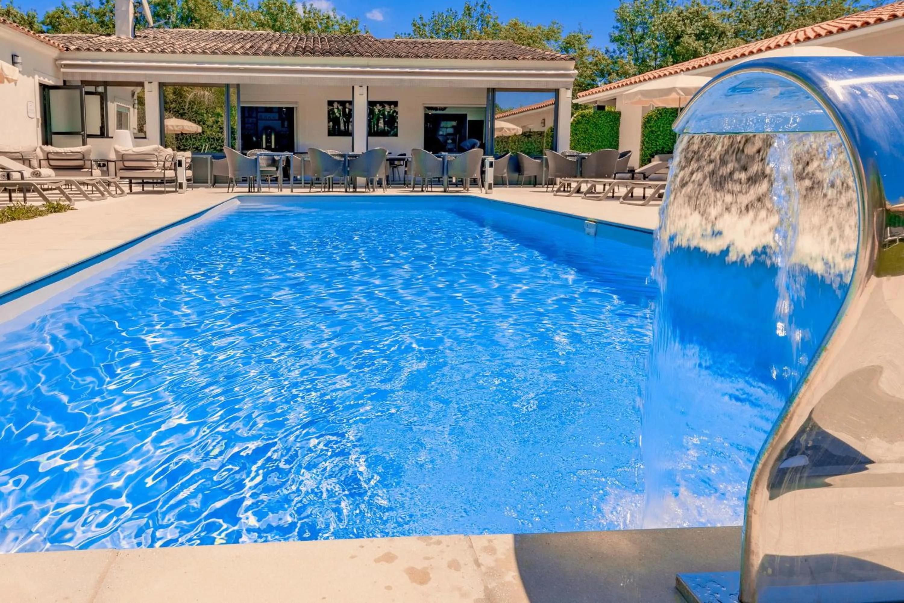 Swimming pool in Hôtel Villa Sophia - ADULTS ONLY JULY AND AUGUST