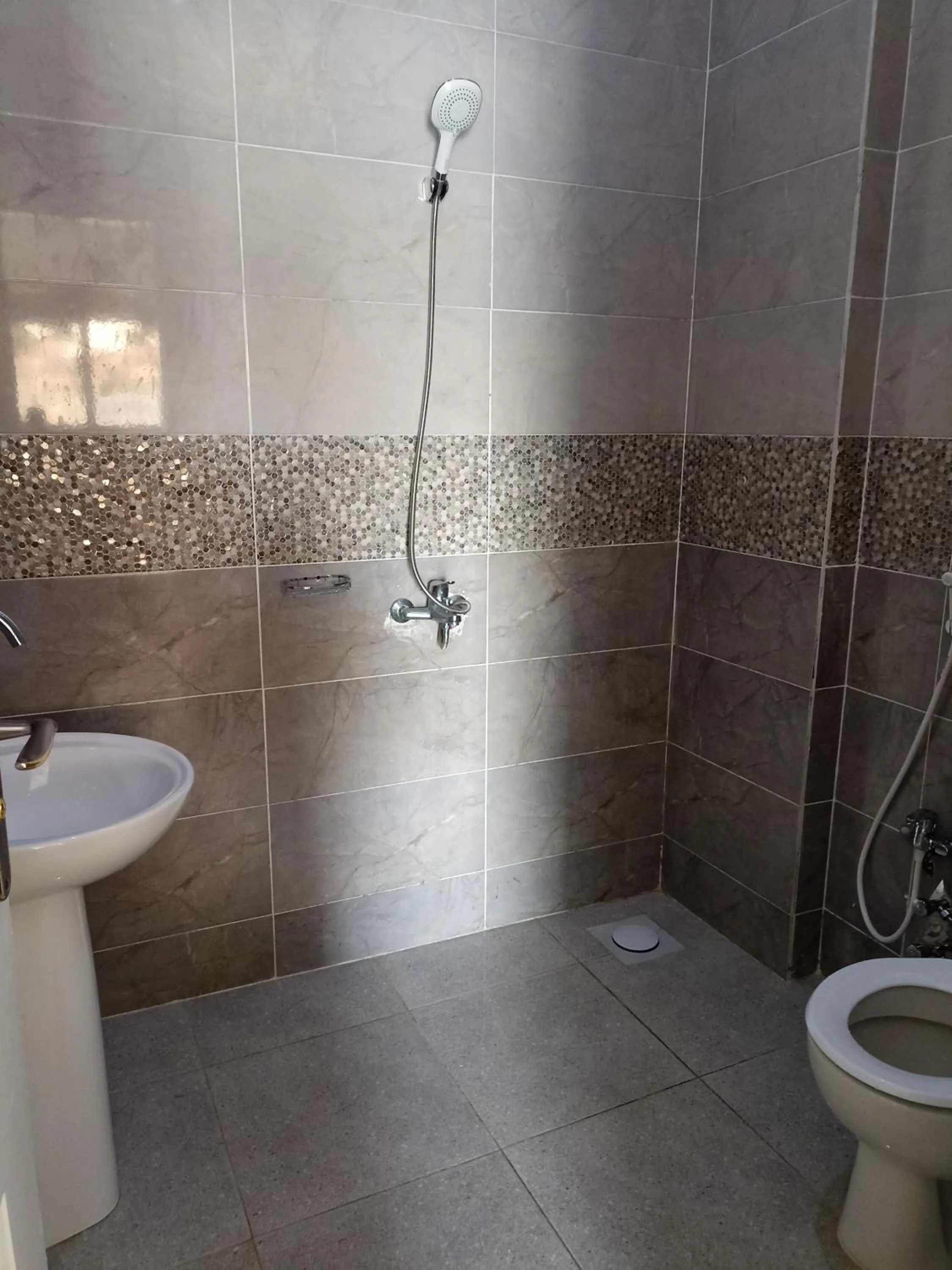 Toilet in Awi Guest House