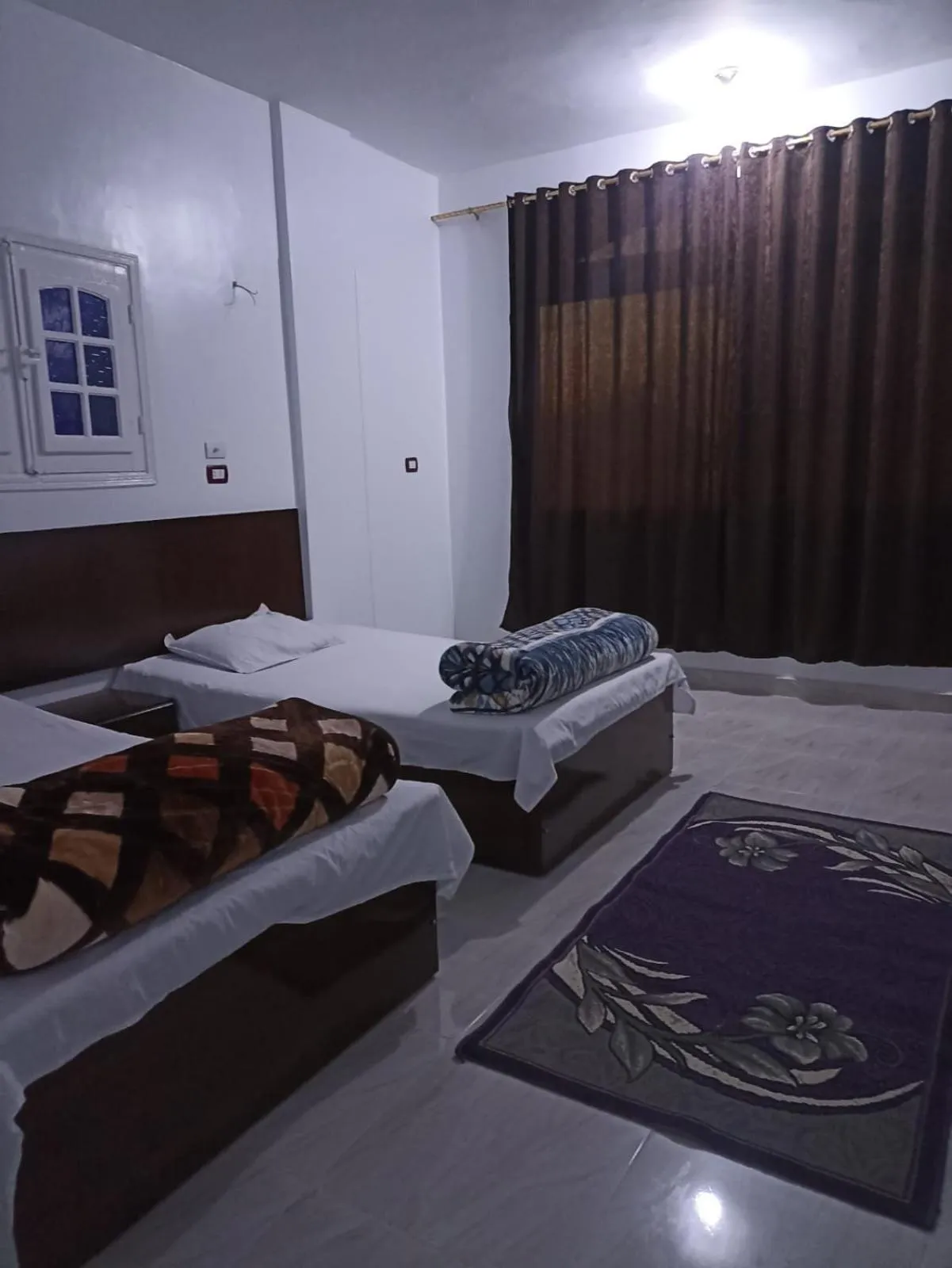 Bed in Awi Guest House