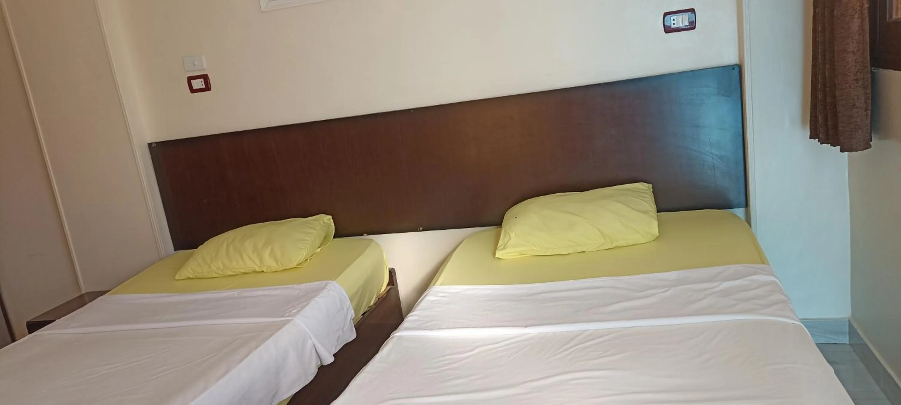Bed in Awi Guest House