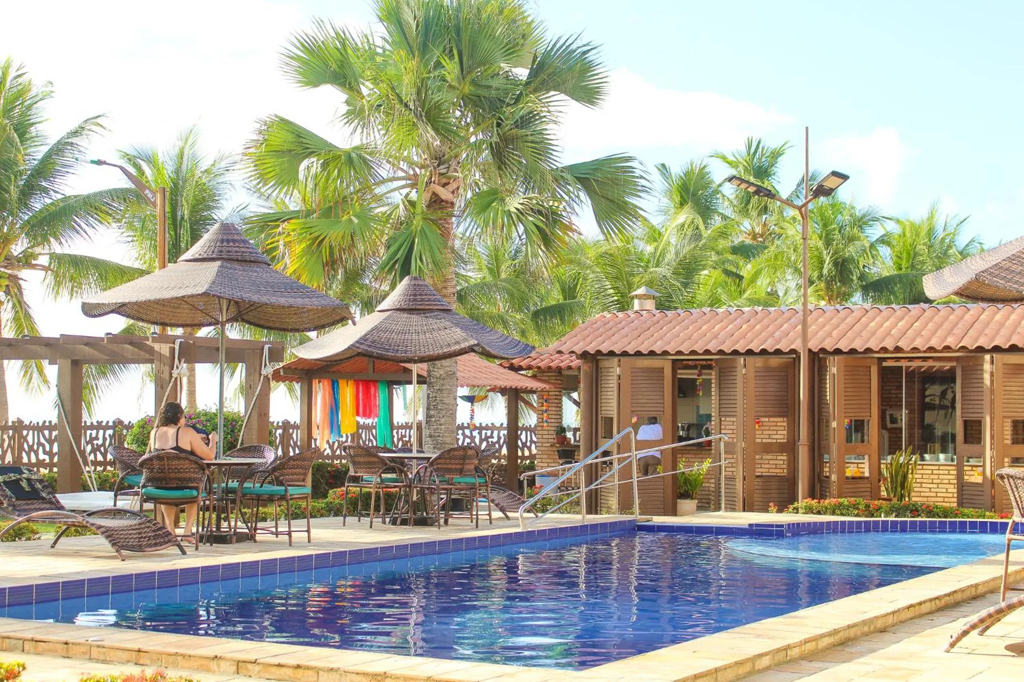 Swimming pool in Pousada Coqueiro Verde