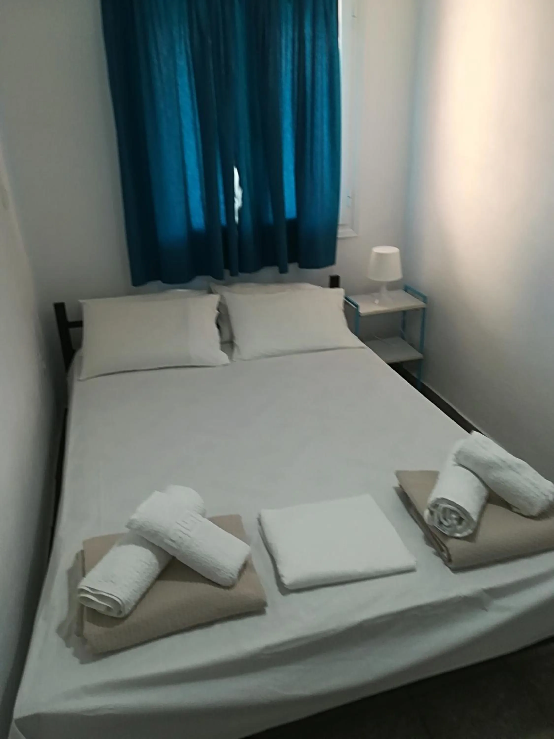 Bed in KOUVERTA APARTMENTS