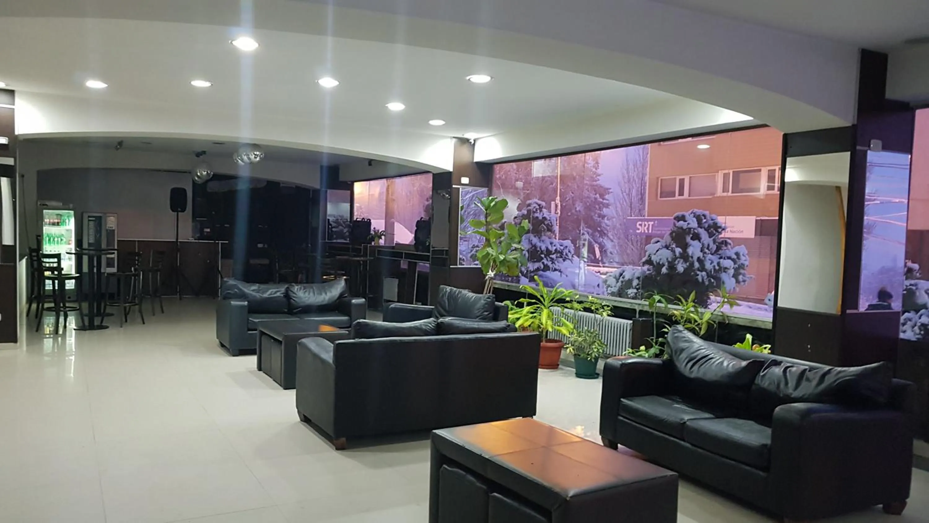 Communal lounge/ TV room in Monte Cervino Hotel