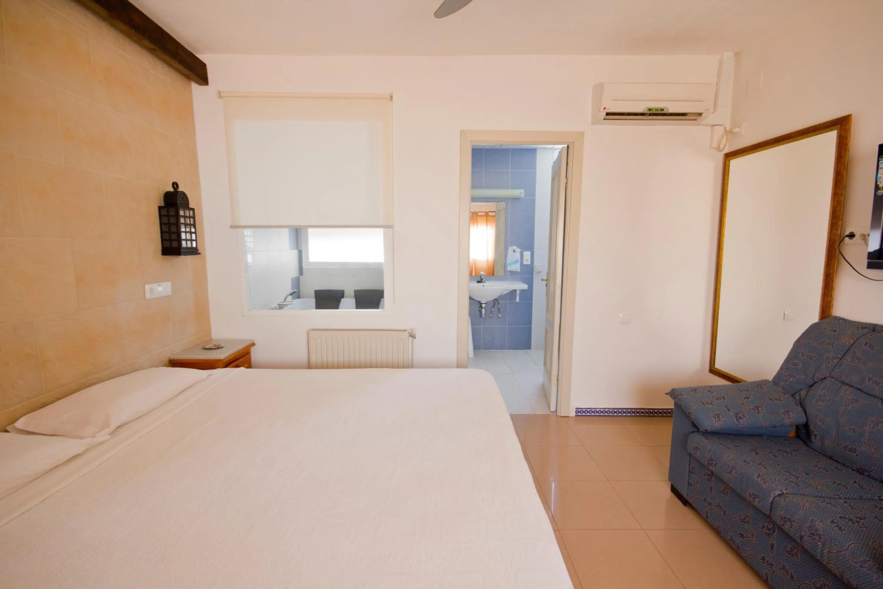 Bed in Hostal Nueva Andalucia