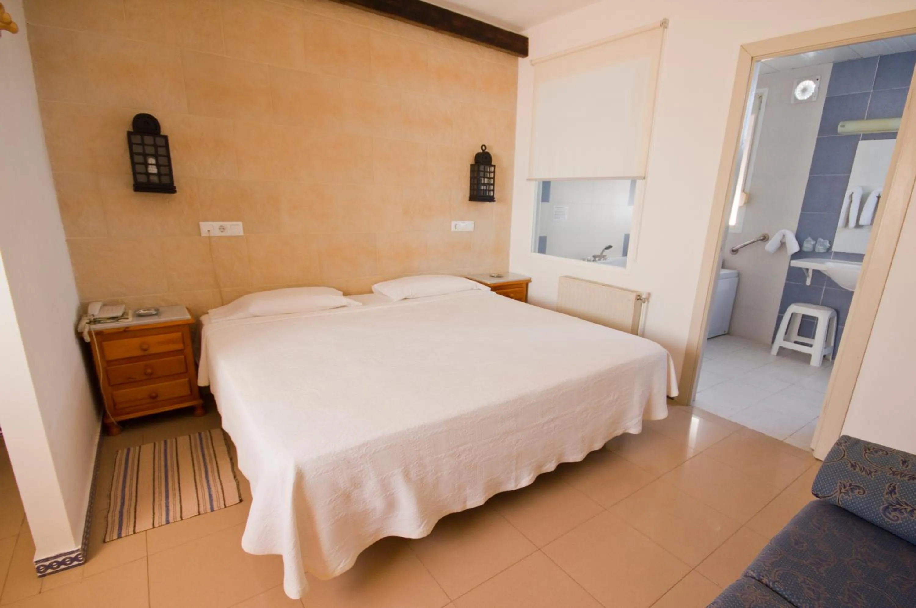 Bed in Hostal Nueva Andalucia