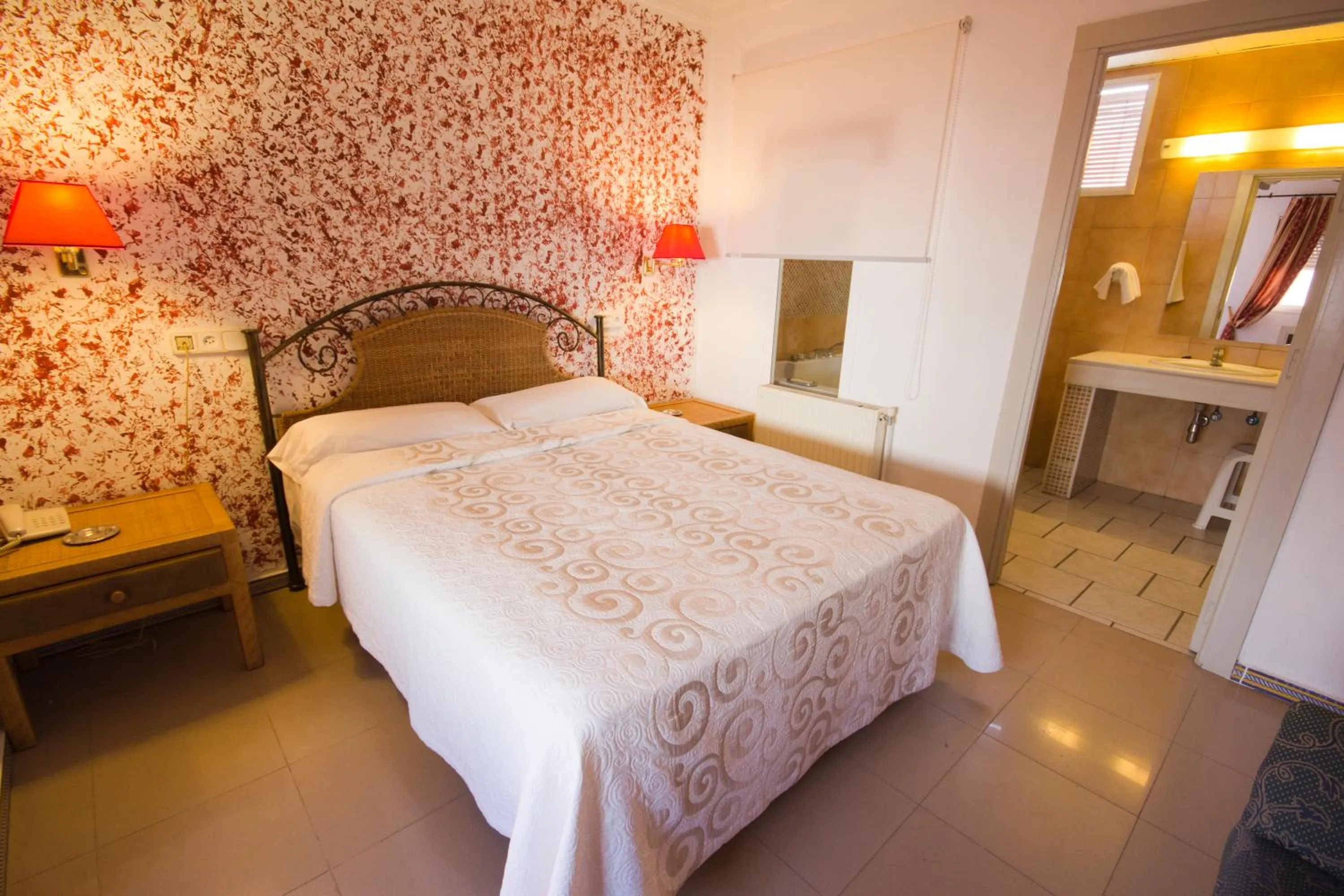 Bed in Hostal Nueva Andalucia