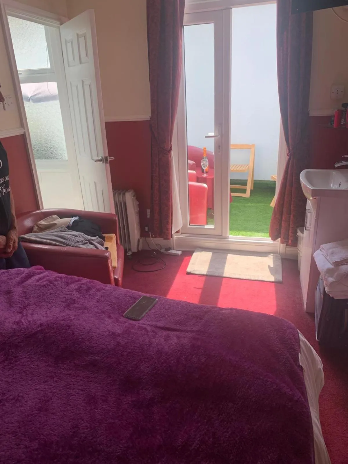 Seating area, Bed in All Seasons Guest House