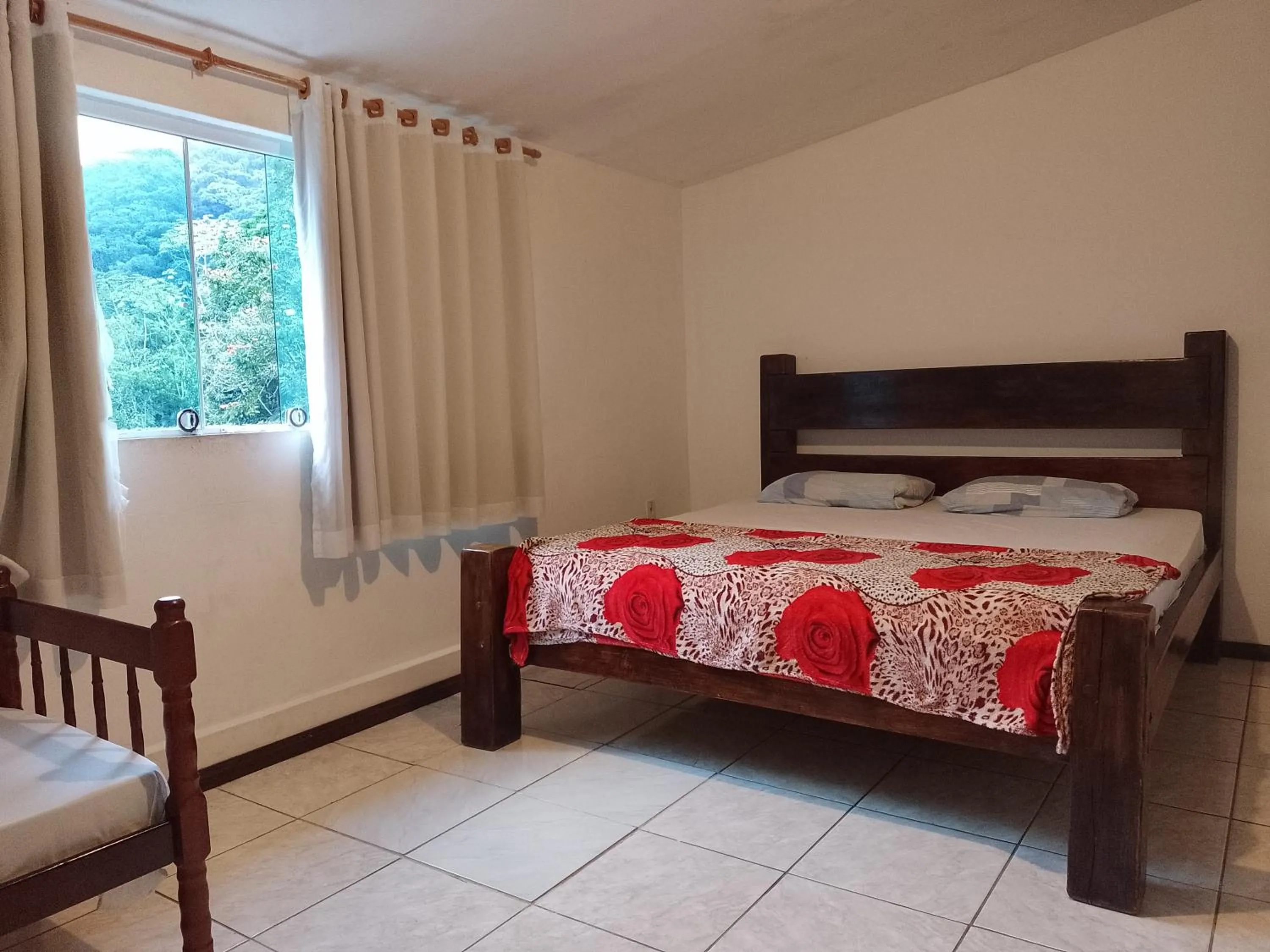 Bed in Pousada Rancho Texas Ubatuba