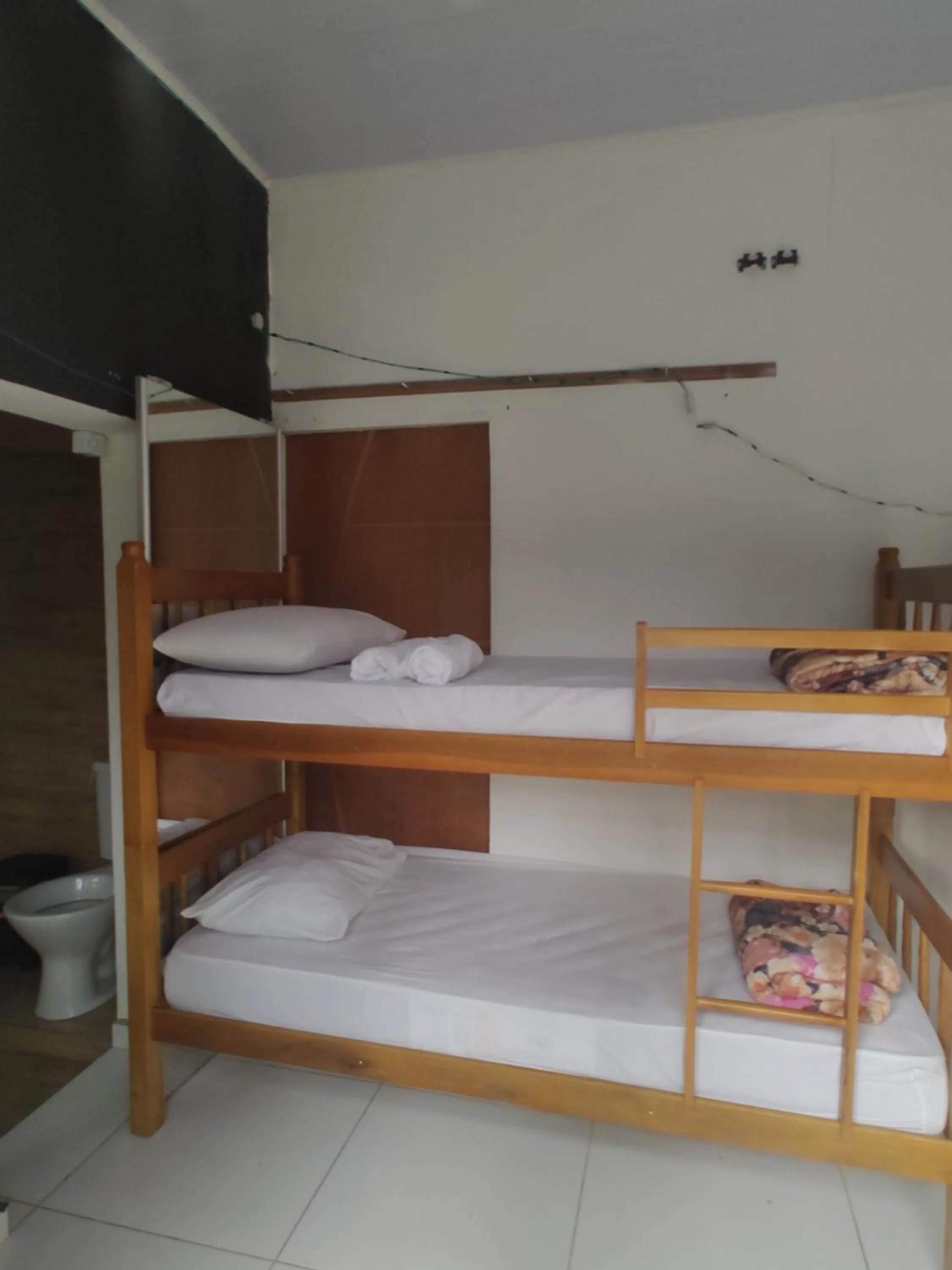 Bed in Pousada Rancho Texas Ubatuba