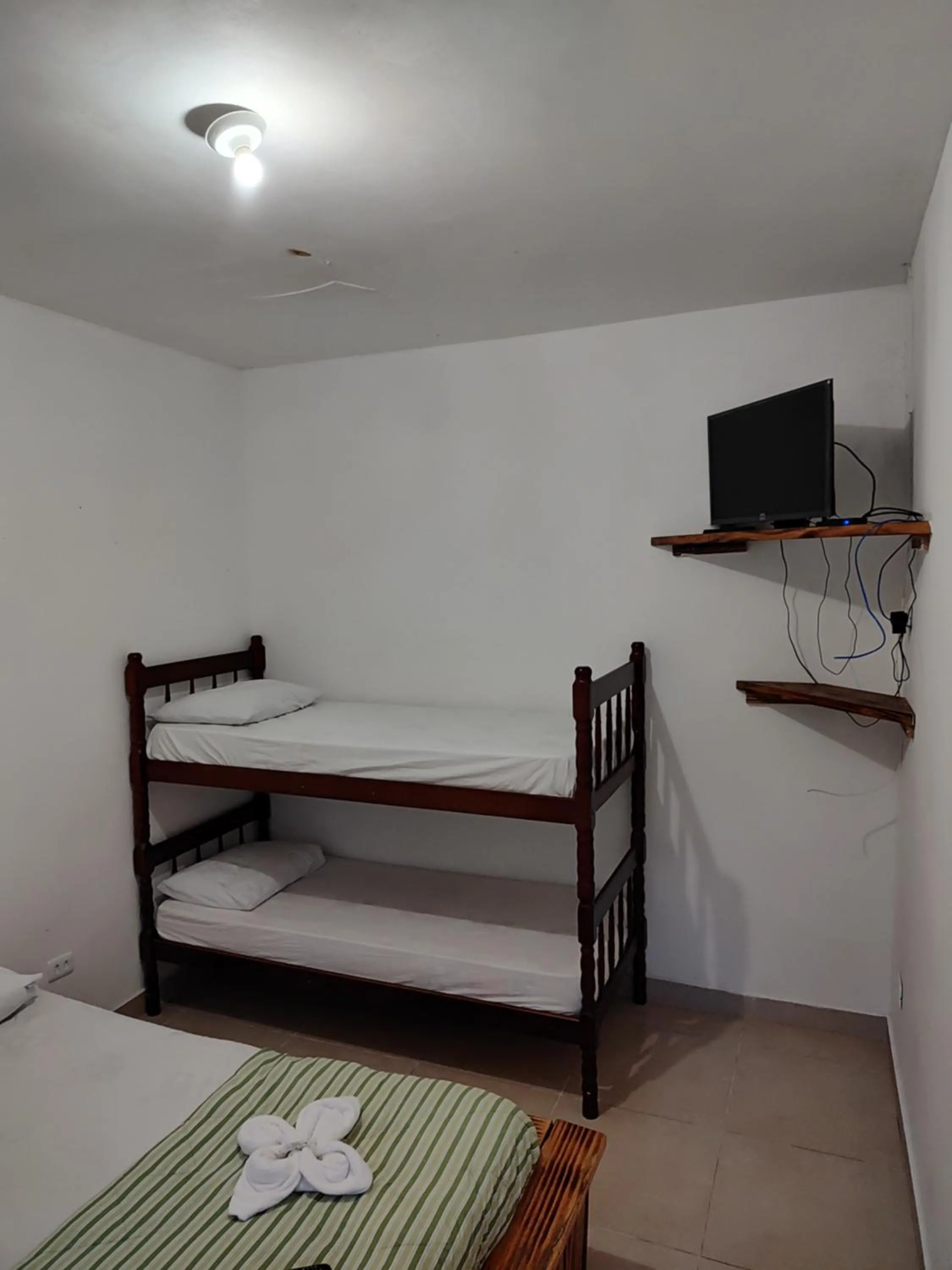 Bed in Pousada Rancho Texas Ubatuba