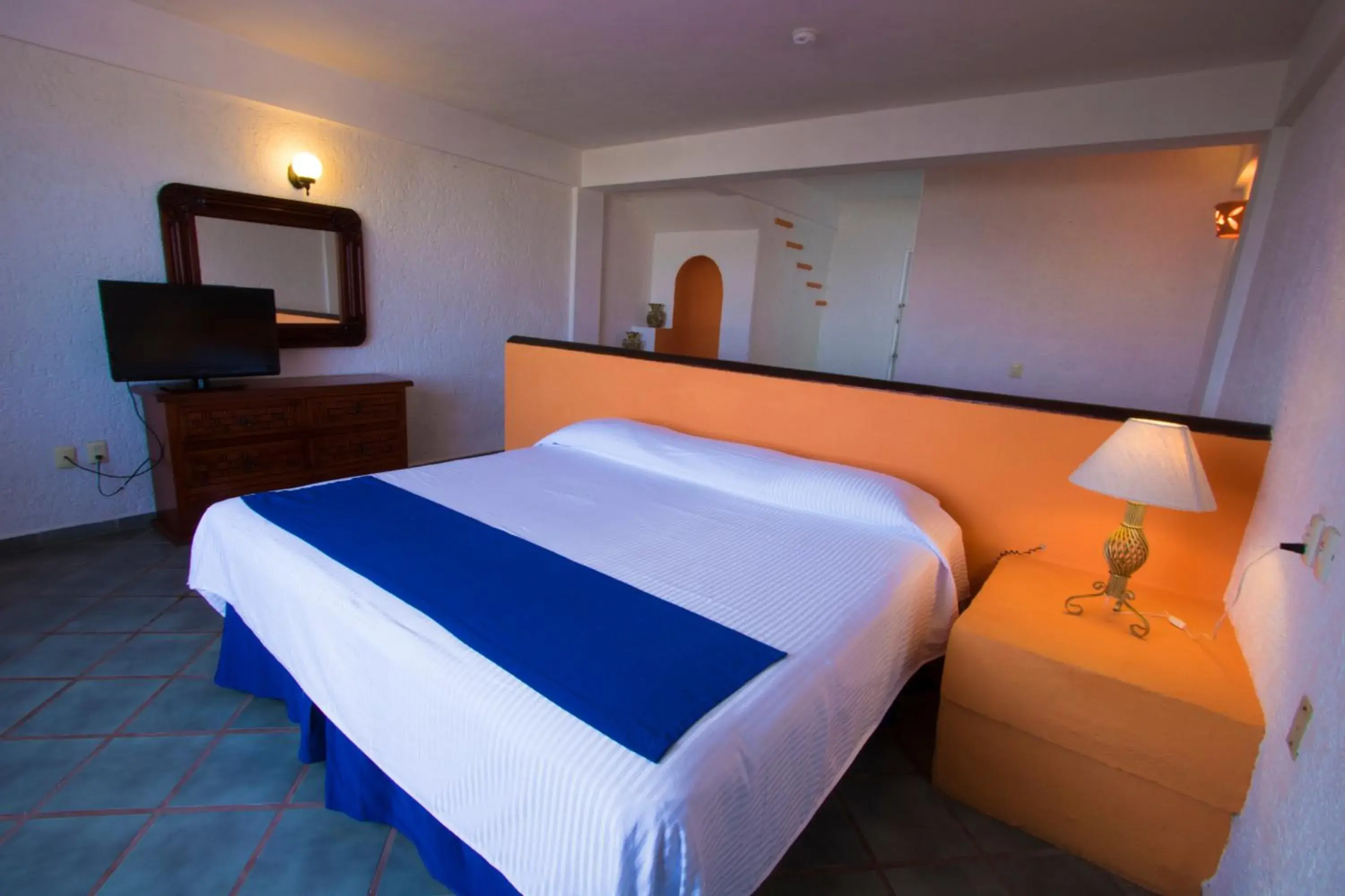 Communal lounge/ TV room, Bed in Decameron Los Cocos Guayabitos, Ramada All-Inclusive Resort Communal lounge/ TV room, Bed in Decameron Los Cocos Guayabitos, Ramada All-Inclusive Resort