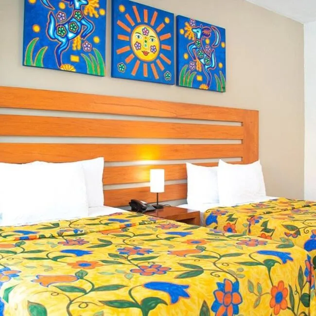 Bed in Decameron Los Cocos Guayabitos, Ramada All-Inclusive Resort