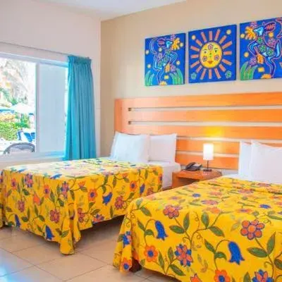 Photo of the whole room, Bed in Decameron Los Cocos Guayabitos, Ramada All-Inclusive Resort Photo of the whole room, Bed in Decameron Los Cocos Guayabitos, Ramada All-Inclusive Resort