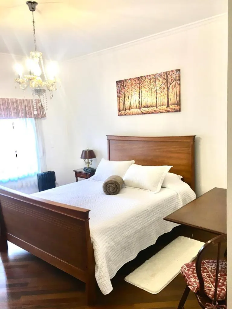 Bed in Center Suiço Flats