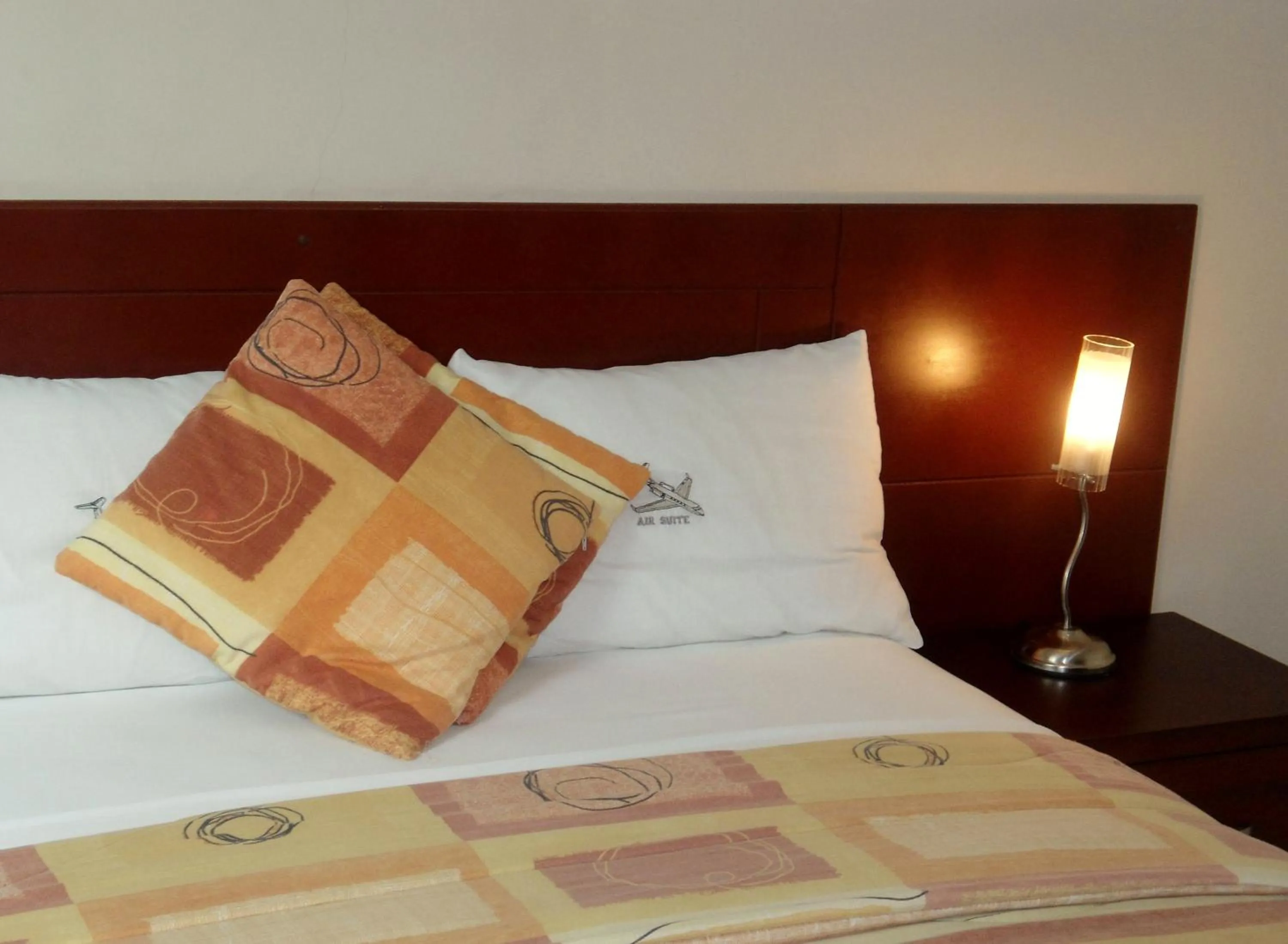 Bed in Hotel Air Suites