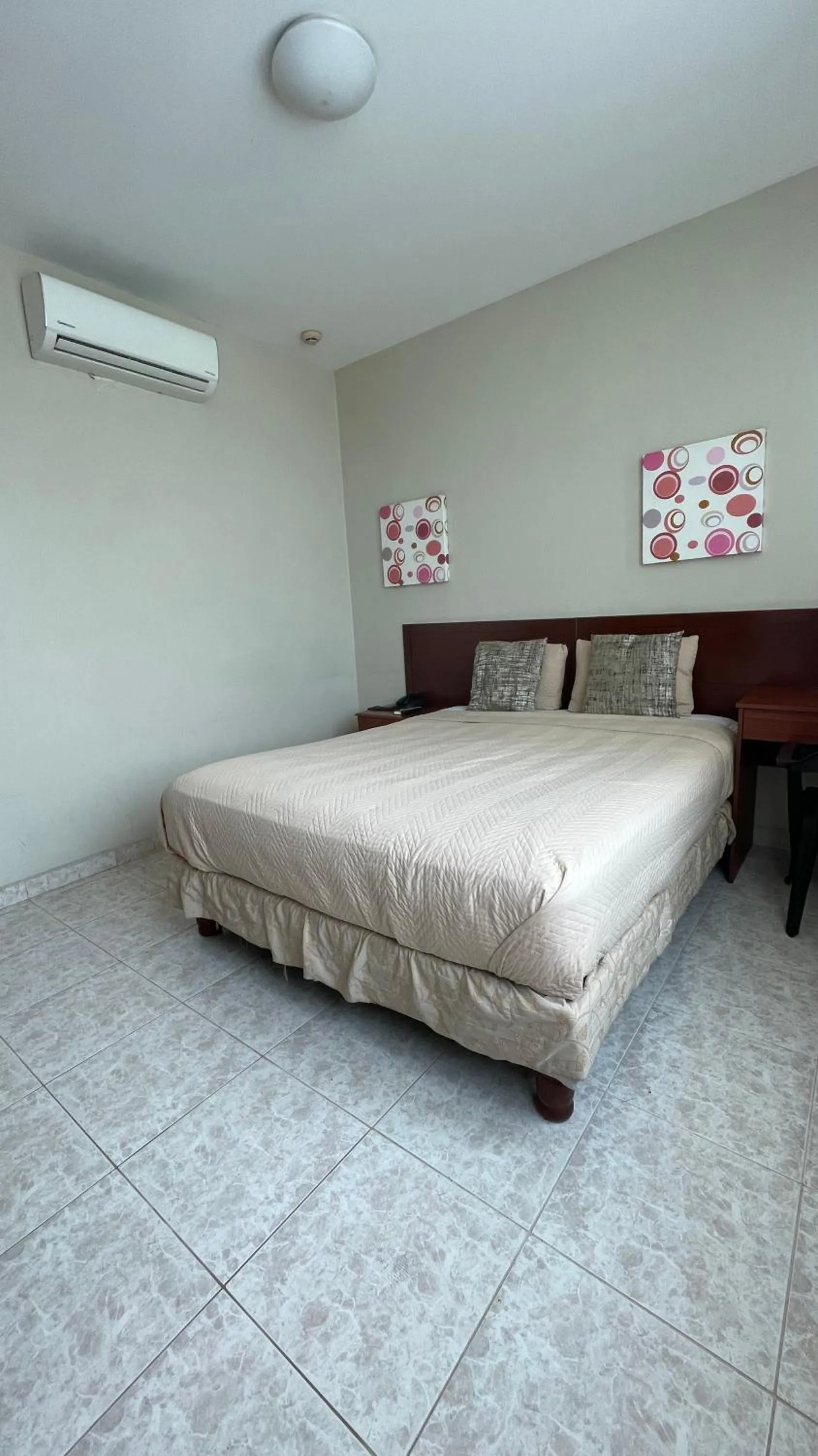 Bed in Hotel Air Suites